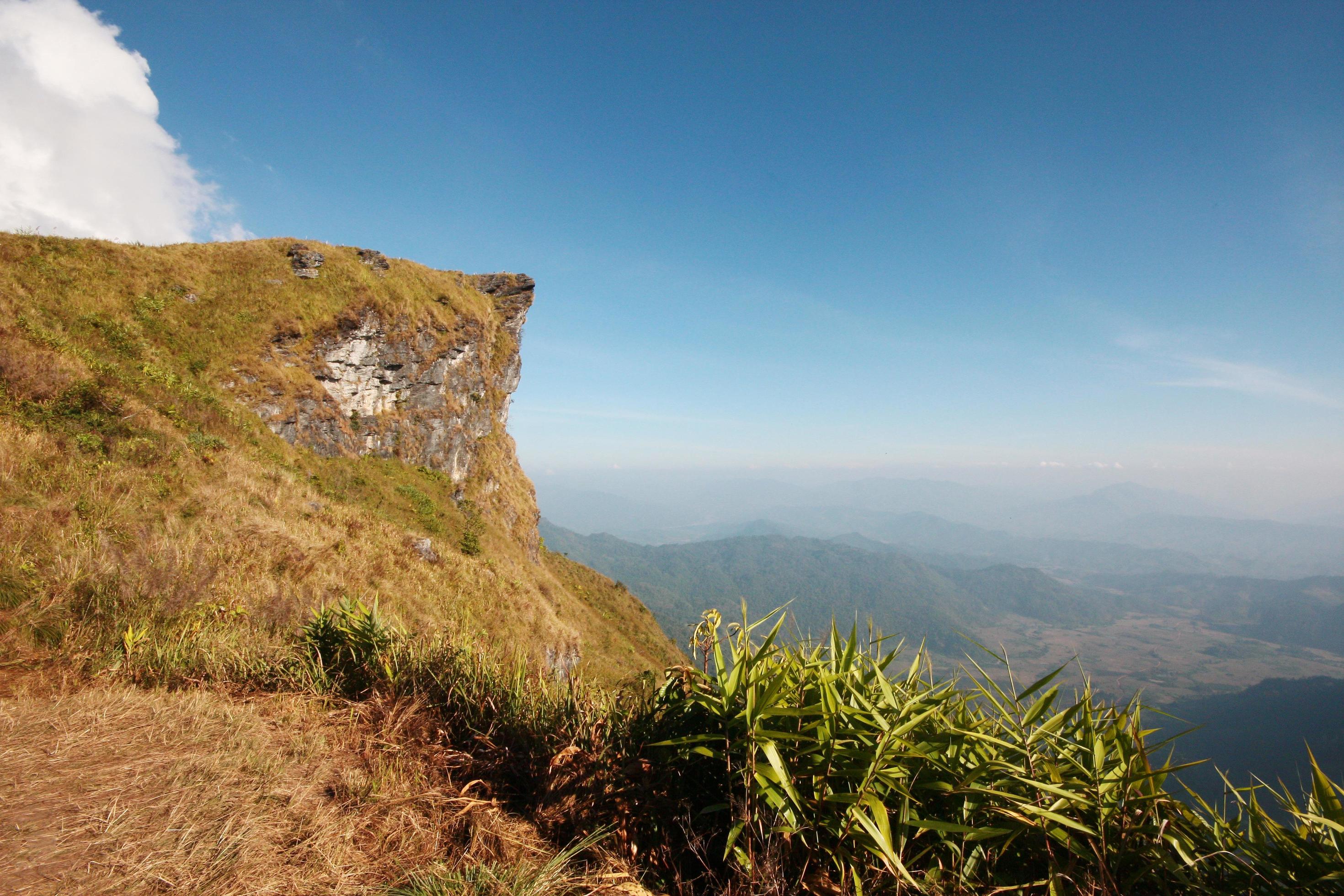 Beautiful landscape valley of mountain and blue sky in winter at Phu Chee Fah hill northern of Thailand Stock Free