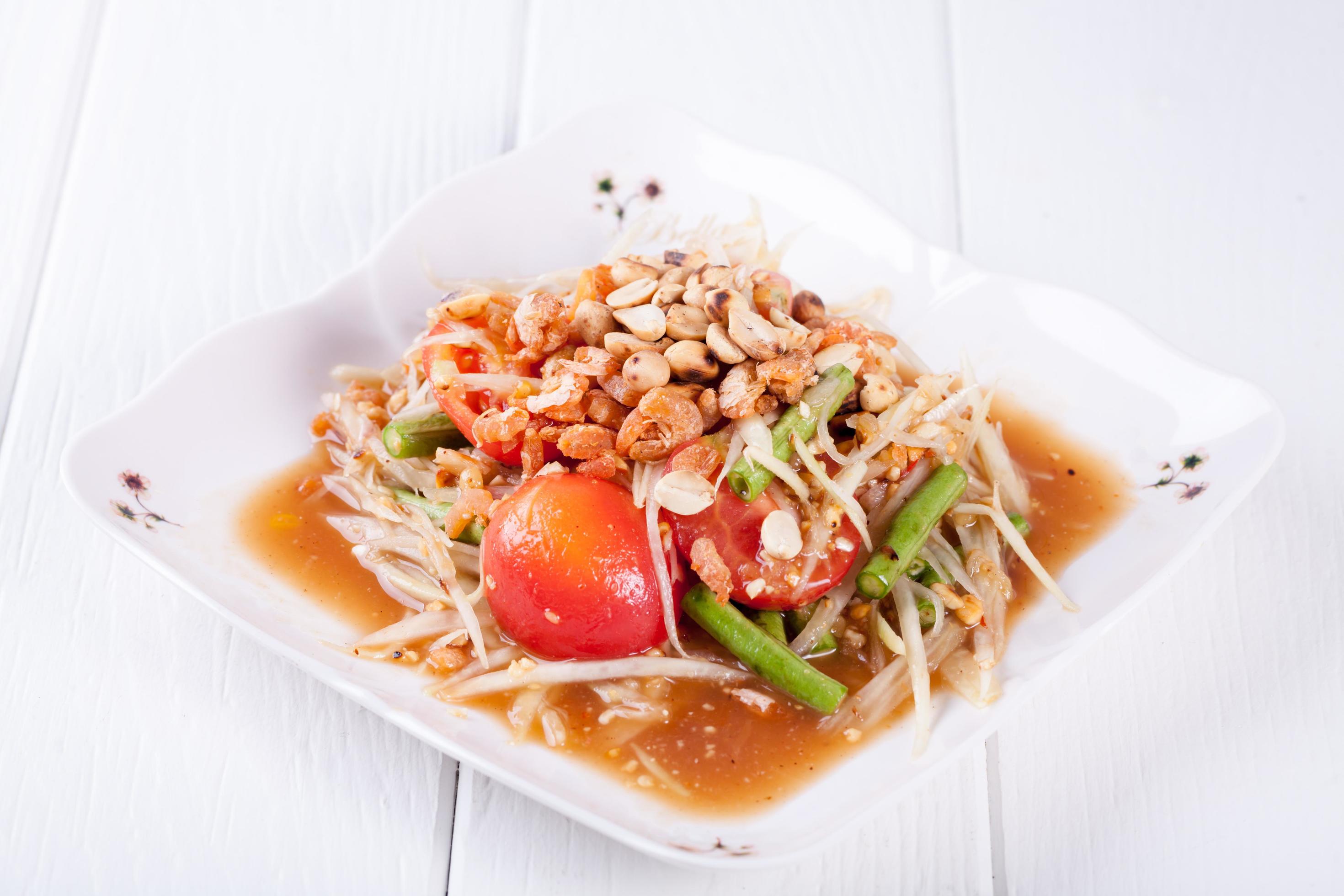 Somtum, papaya salad delicious food in thailand Stock Free