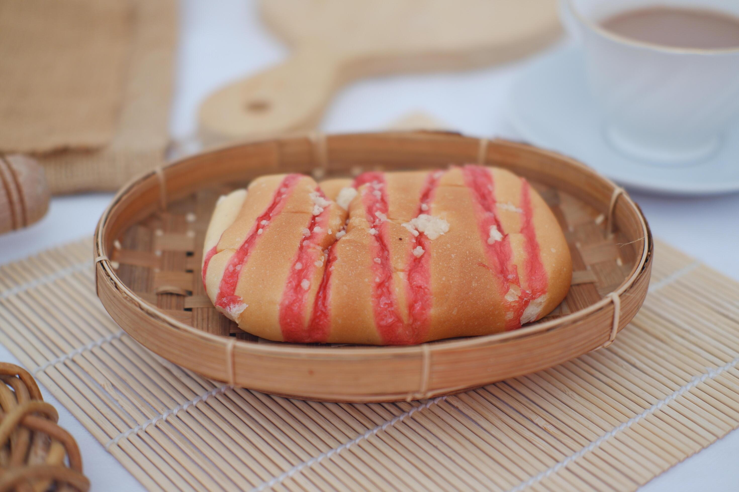 Strawberry bread and milk chocolate on a bamboo mat Stock Free