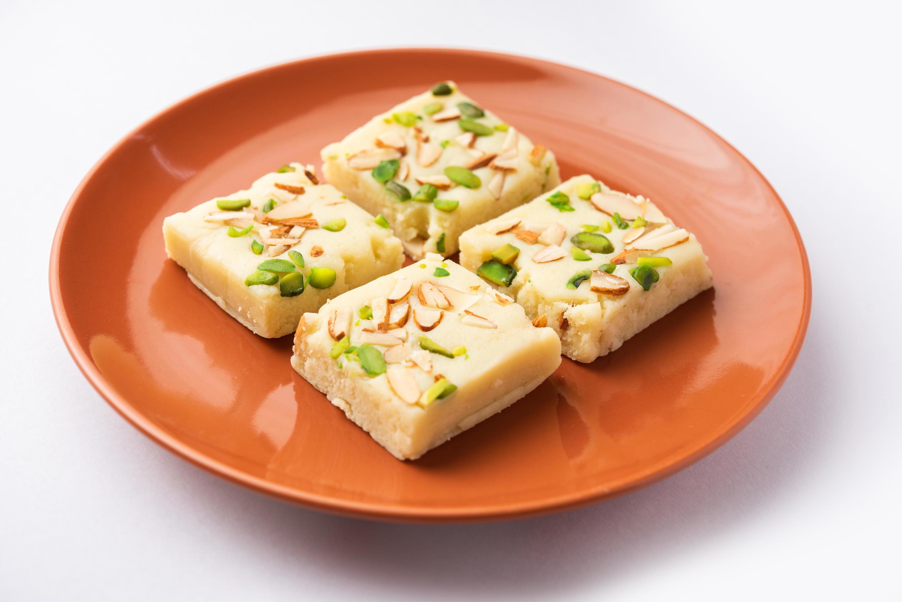 Milk powder barfi also known as Mava burfi, white Khoya burfi or Barfee, Indian Sweet food Stock Free