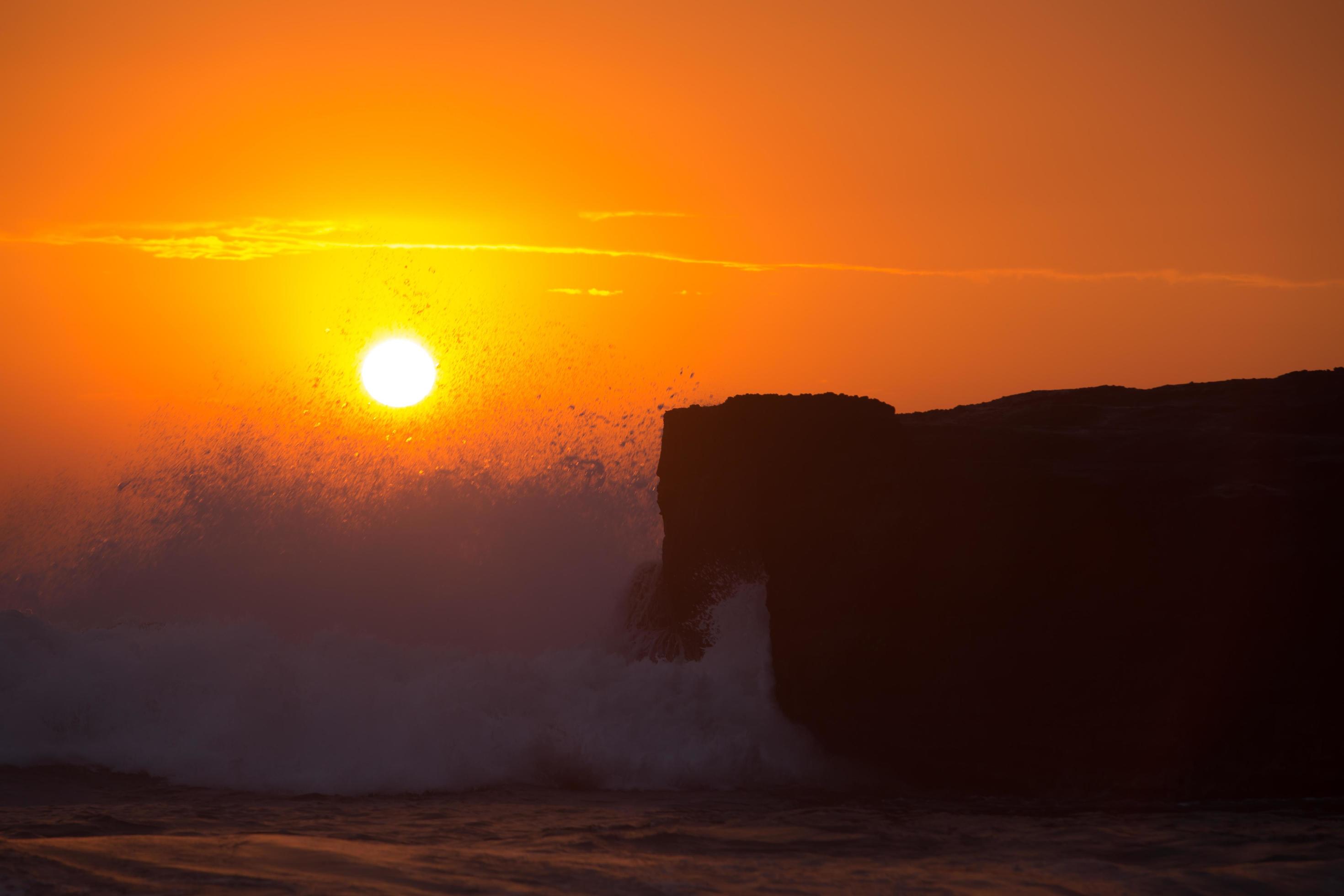 sunset over hindu temple Pura Tanah Lot, Bali, Indonesia Stock Free