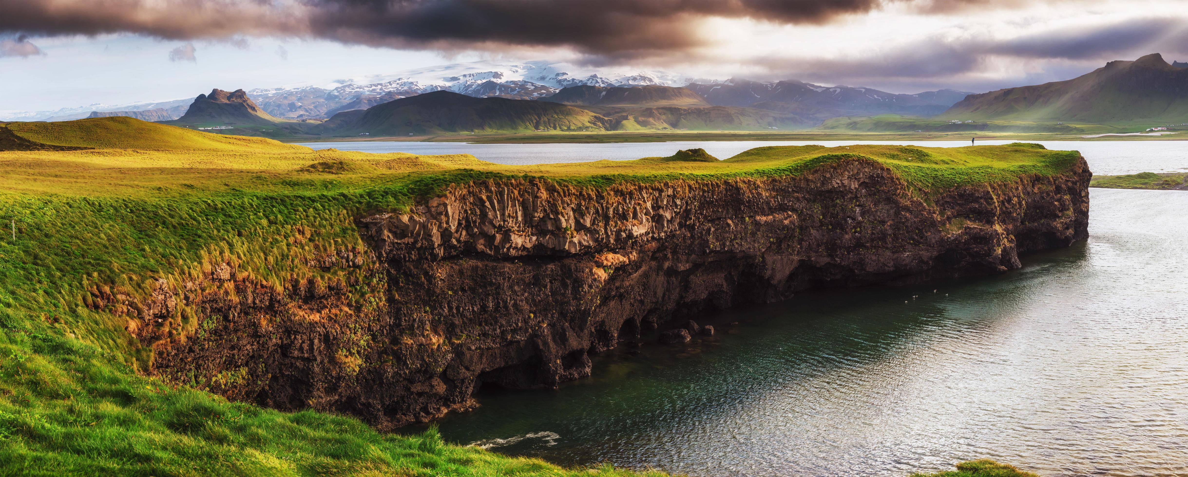 Reynisfjara black sand beach in Iceland. Reynisfyal Mountains. Stock Free