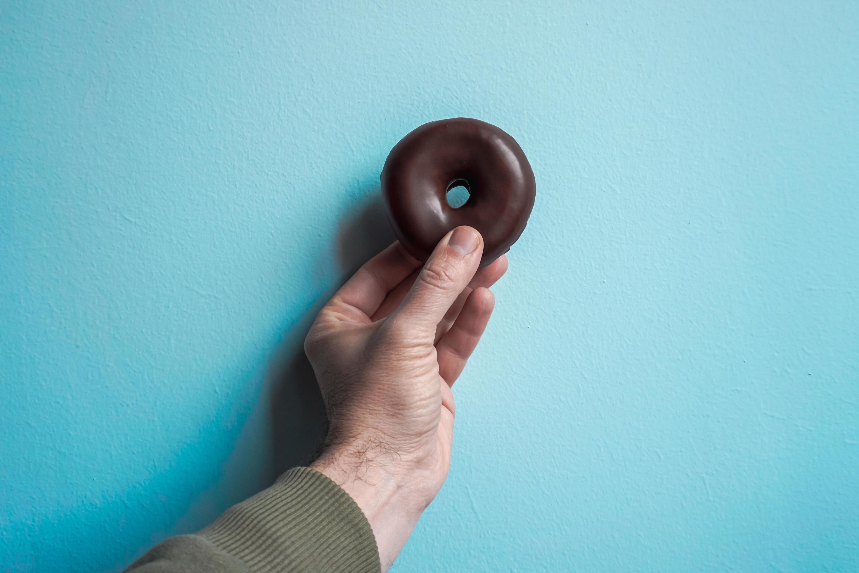 tasty chocolate donut for brunch, unhealthy food Stock Free