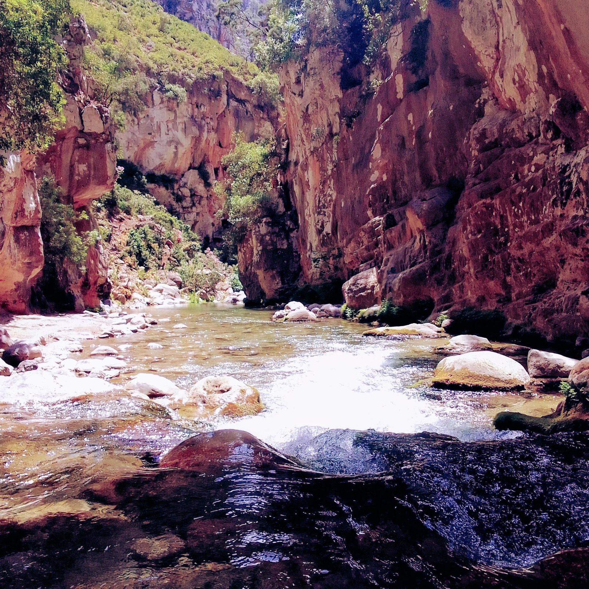 Discover the picturesque beauty of the valley between the mountains of Chefchaouen, a breathtaking journey to the heart of nature grandeur Stock Free