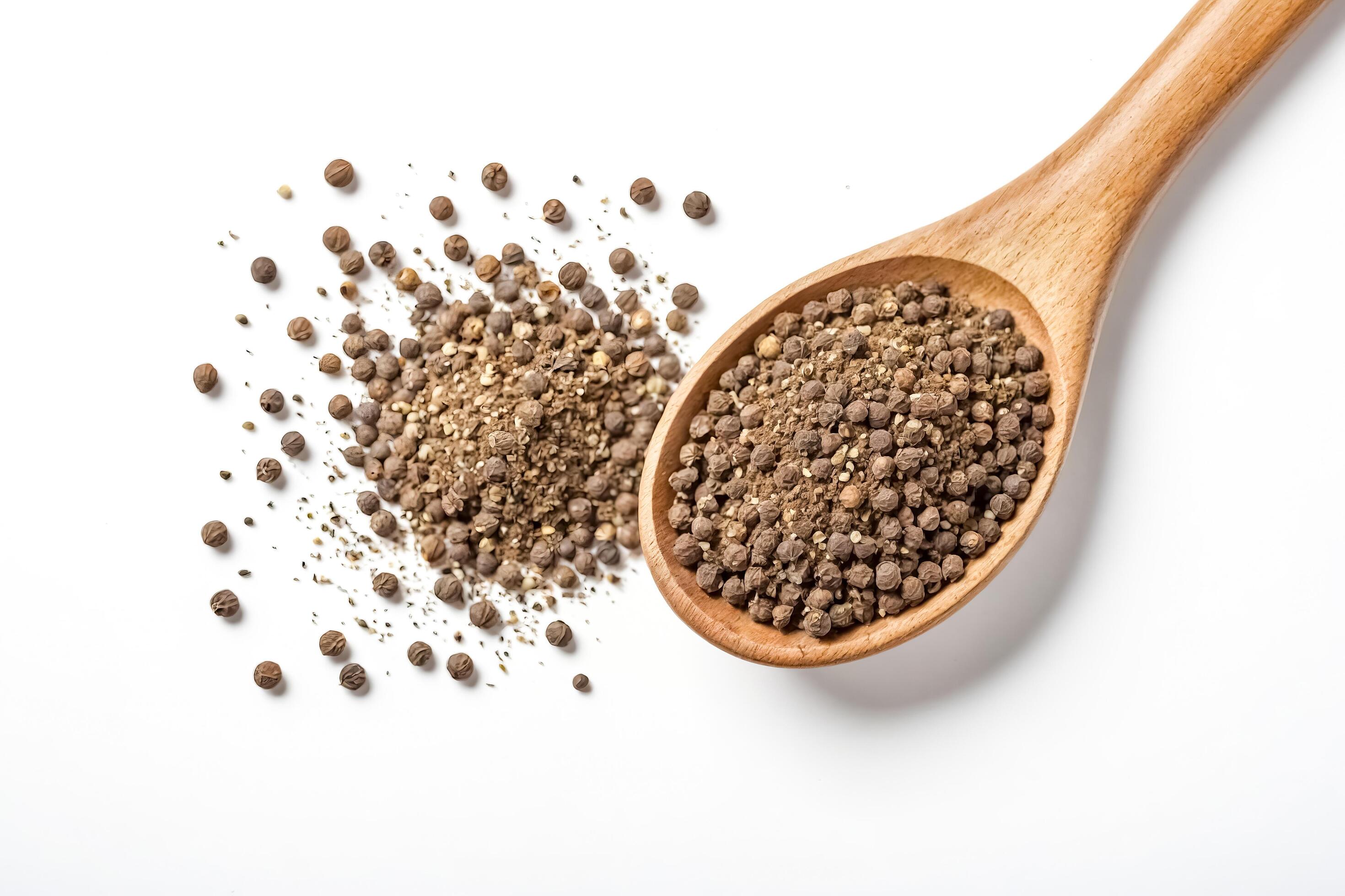 Black Peppercorns in Wooden Spoon on White Background Stock Free