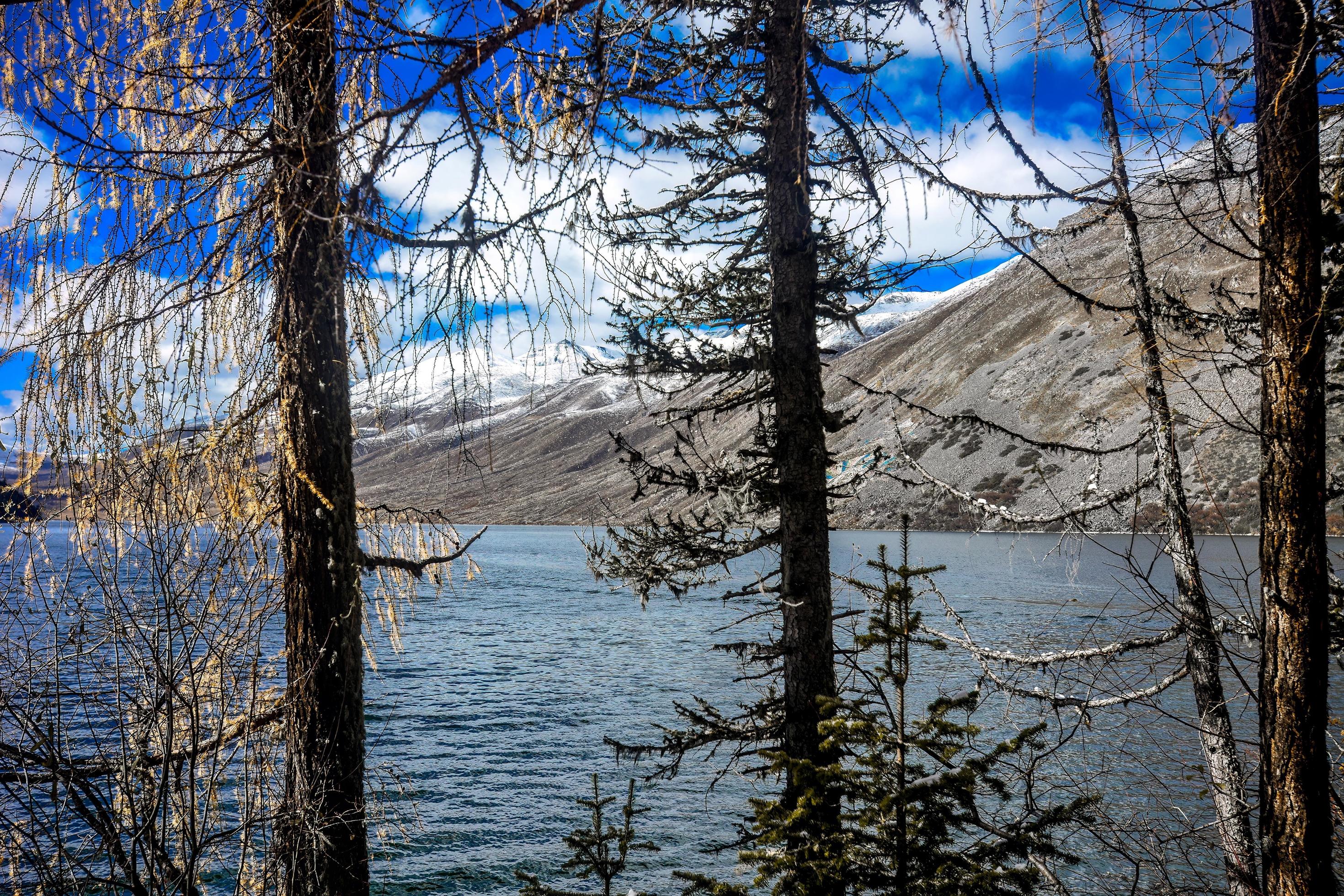 Spectacular scenery in the high mountains of western Sichuan, China, with different seasons Stock Free