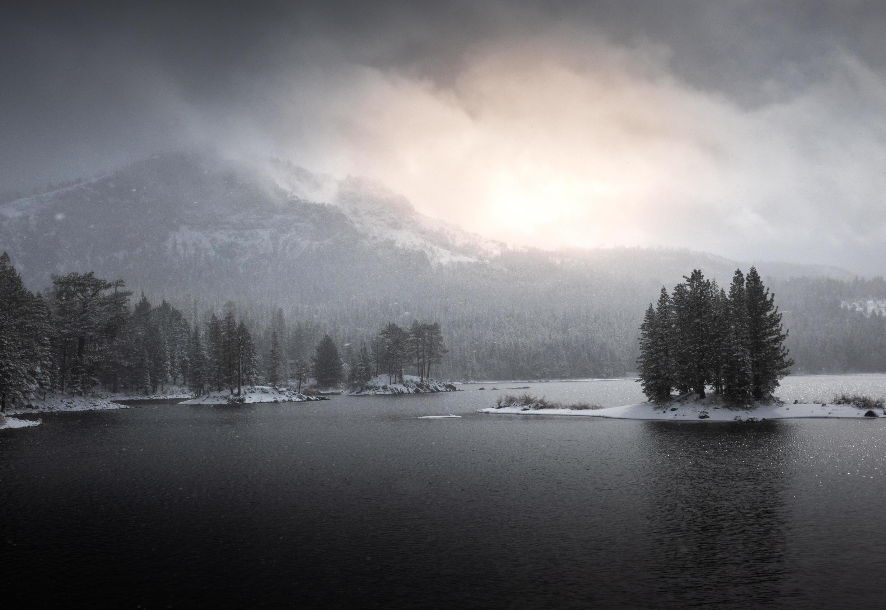 Sunrise over a beautiful mountain lake scene in Tahoe National Forest in Northern California. Stock Free