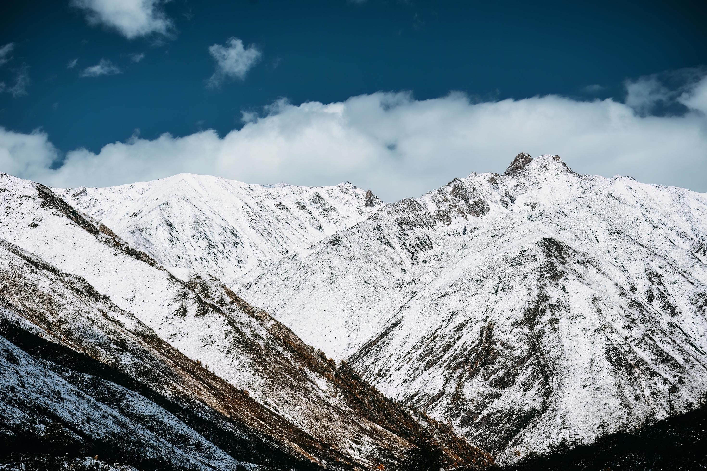 Spectacular scenery in the high mountains of western Sichuan, China, with different seasons Stock Free