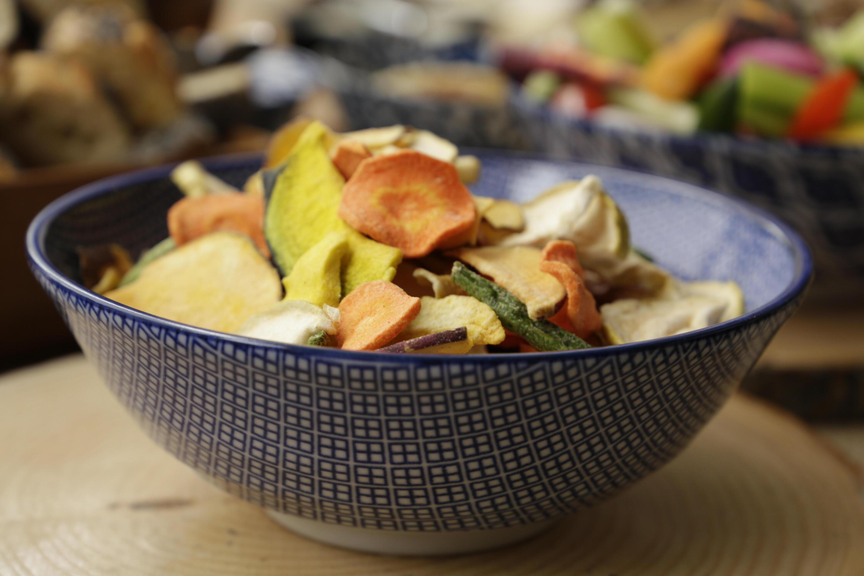 a bowl with crispy baked vegetables, healthy lifestyle Stock Free