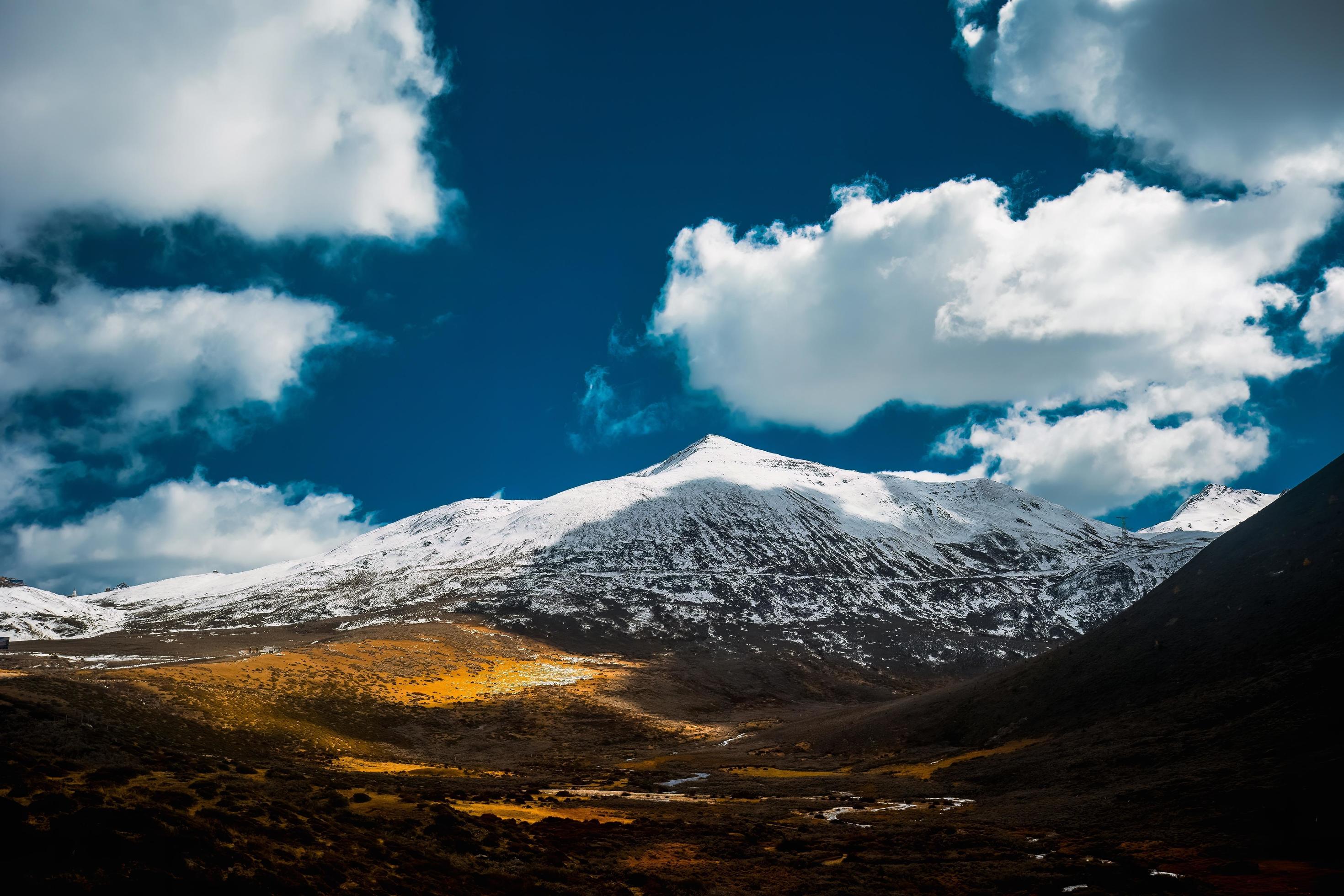 Spectacular scenery in the high mountains of western Sichuan, China, with different seasons Stock Free