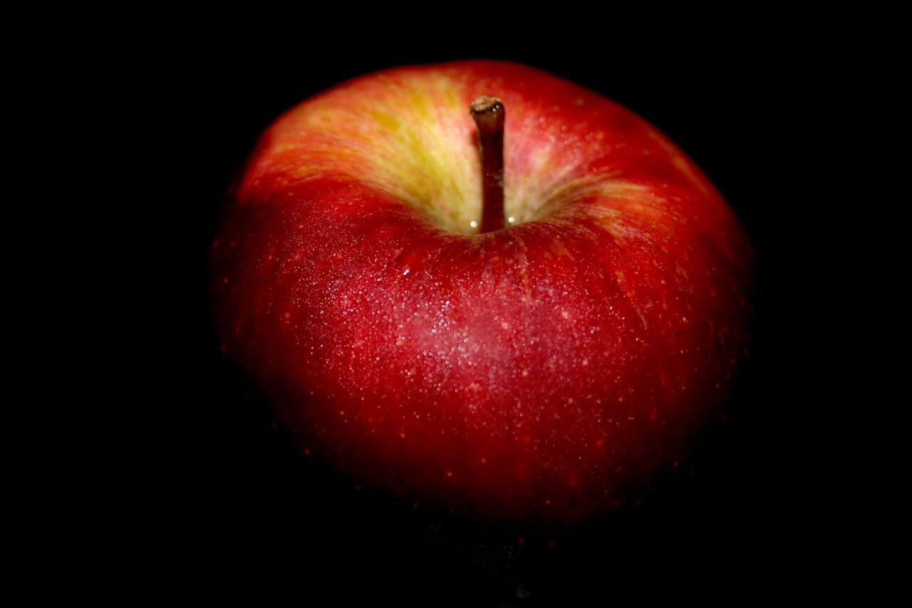 Apple Against Black Background Stock Free