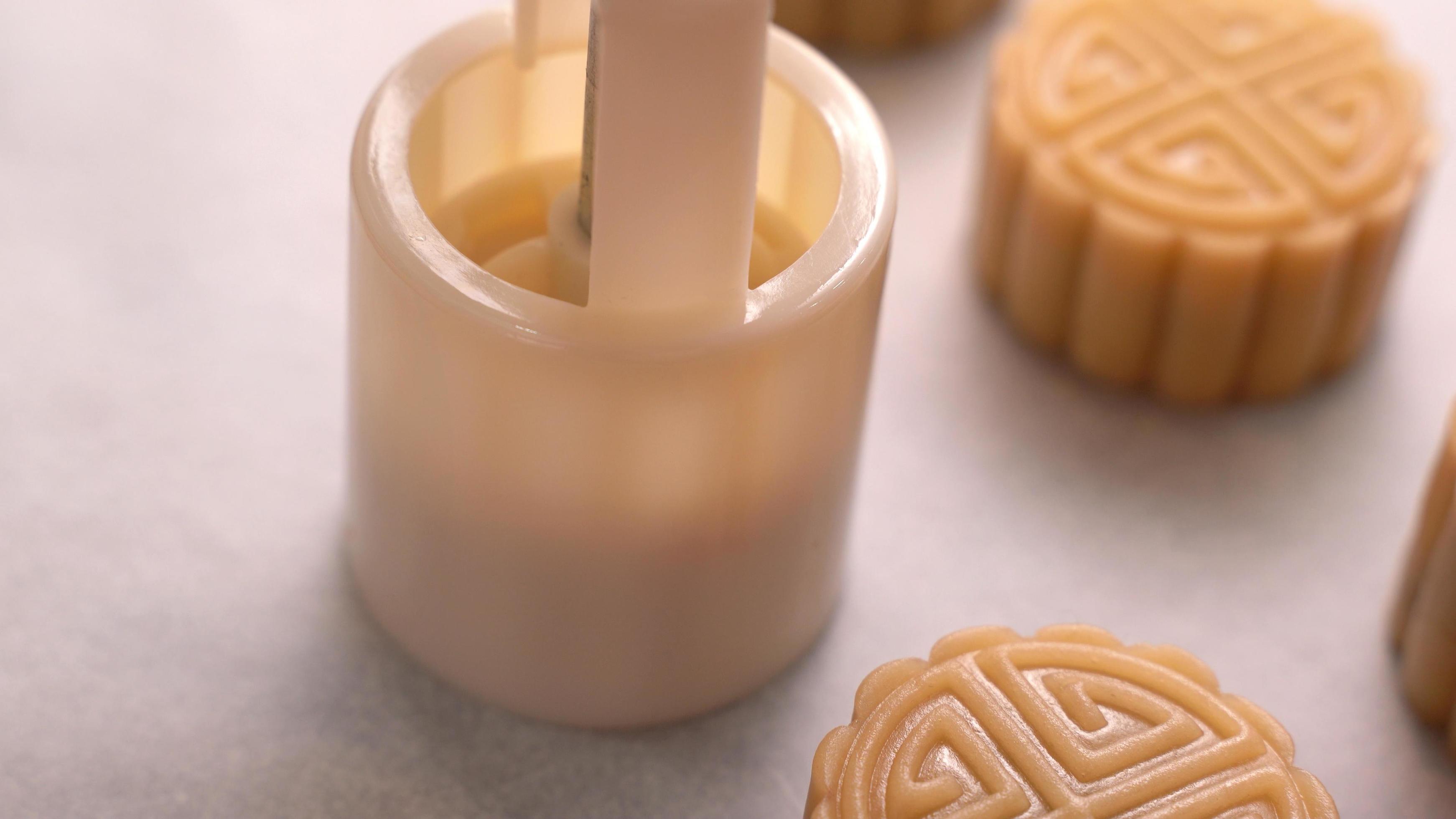 Homemade cantonese moon cake pastry on baking tray before baking for traditional festival, close up, lifestyle. Stock Free