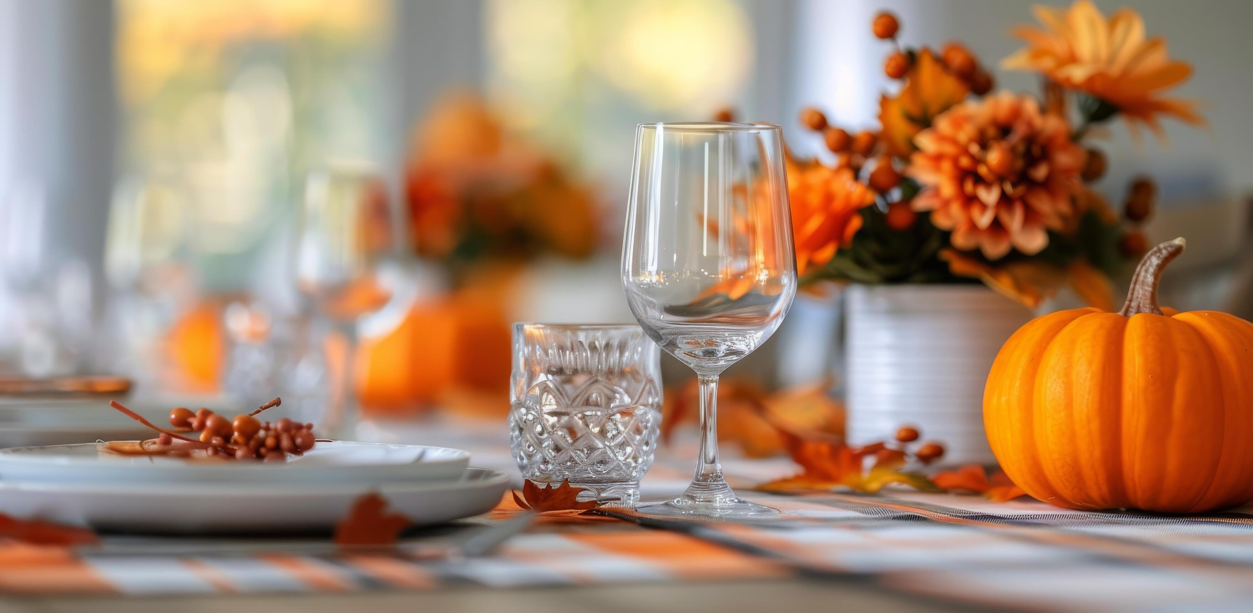 Autumn Harvest Table Decor With Pumpkins and Wine Glasses in Cozy Setting Stock Free