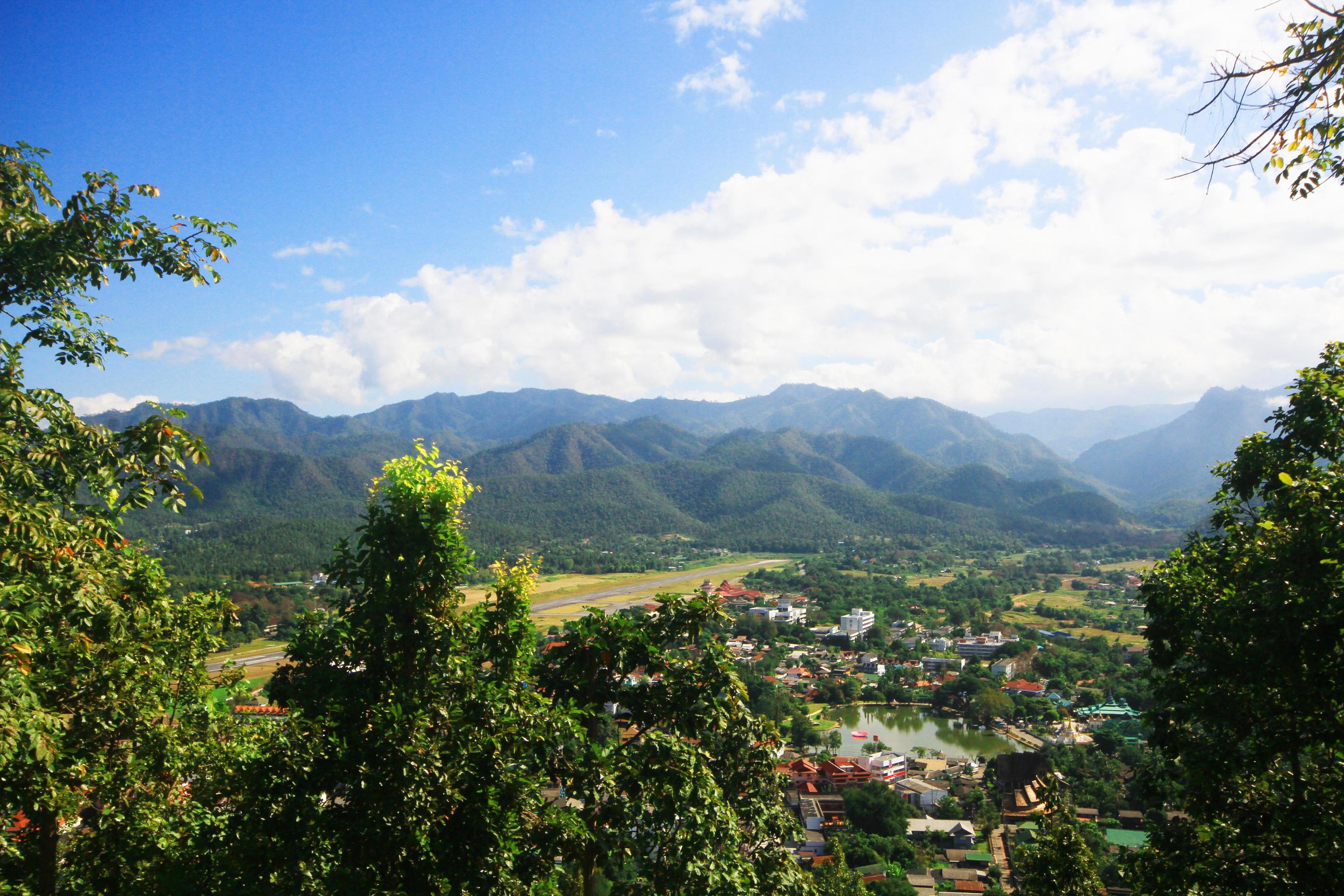 Beautiful Mountain viewpoint on hill can see from bird eyes view to Village in town of countryside at notrhern of Thailnad Stock Free