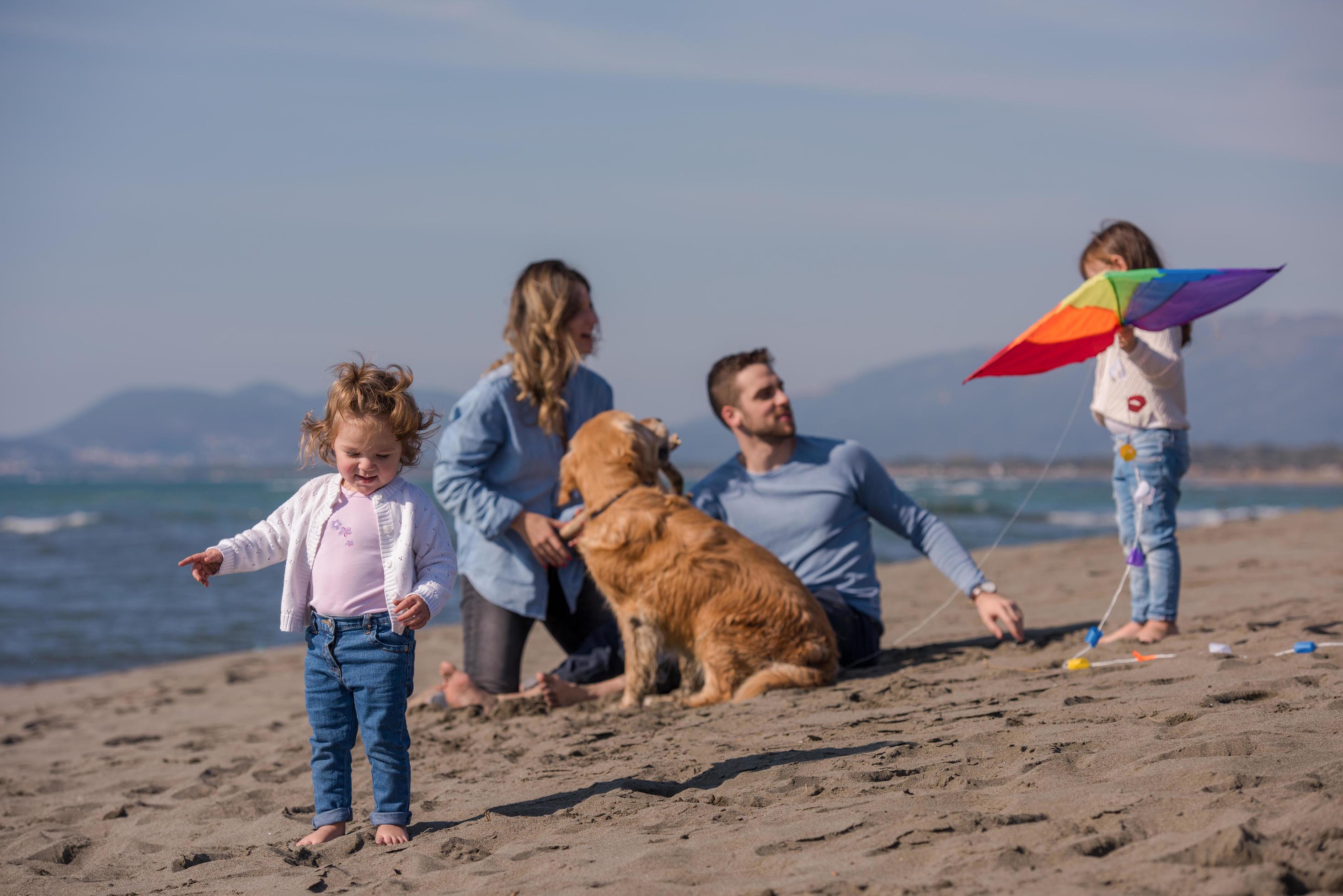 happy young family enjoying vecation during autumn day Stock Free