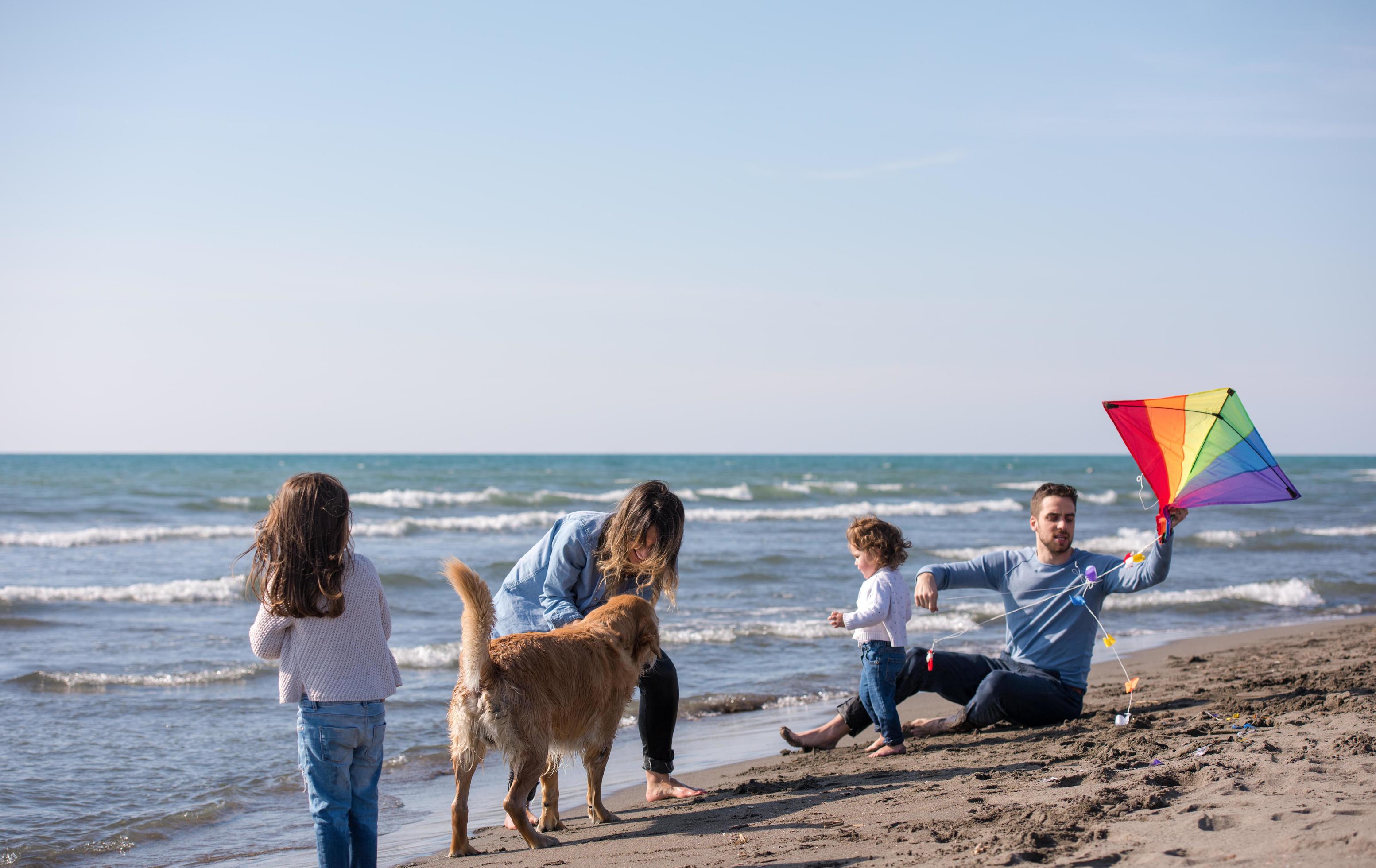 happy young family enjoying vecation during autumn day Stock Free