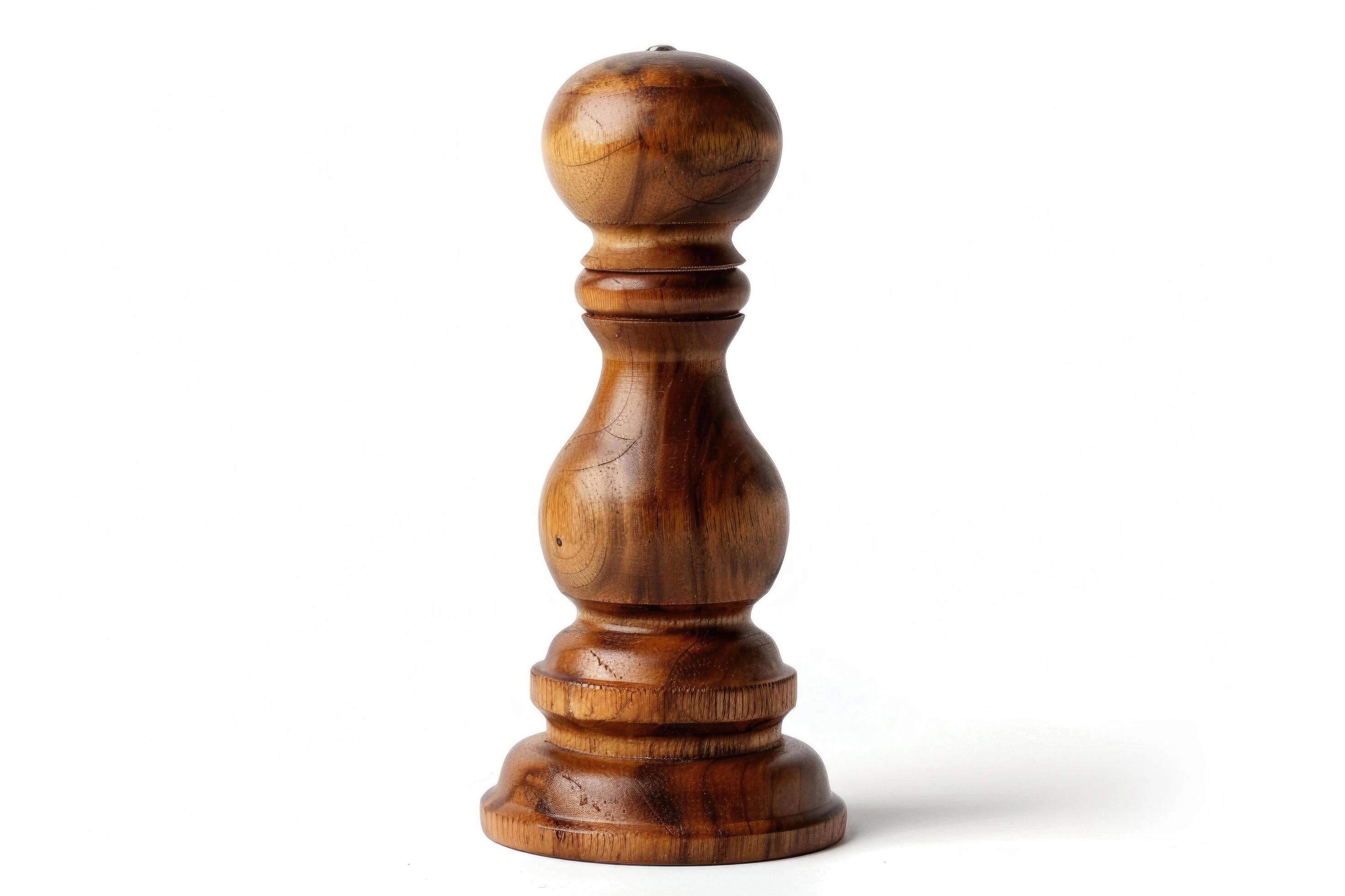 Wooden pepper mill on a white background. Stock Free