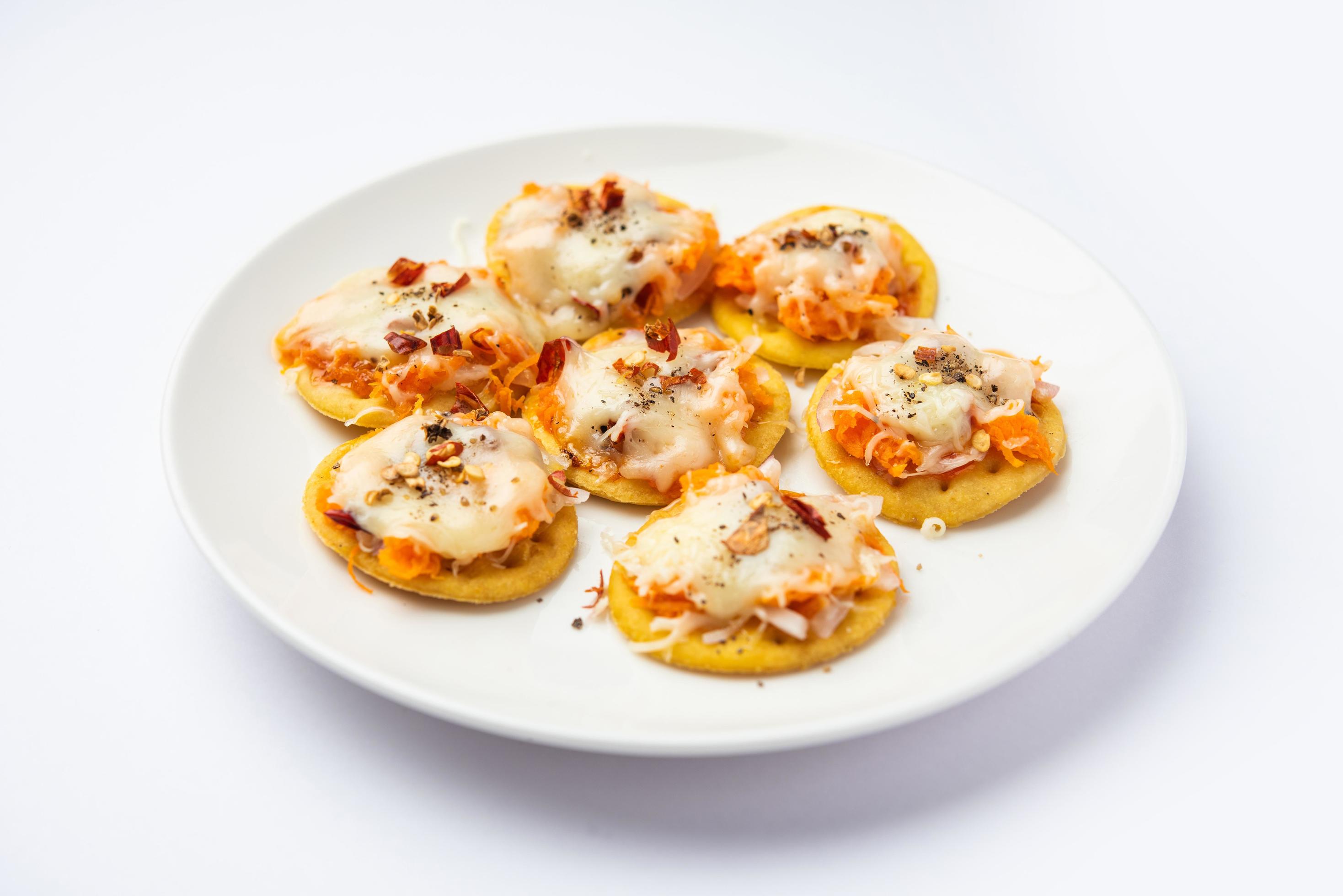 Papdi pizza are mini food bites, Indian kids favourite party snack Stock Free