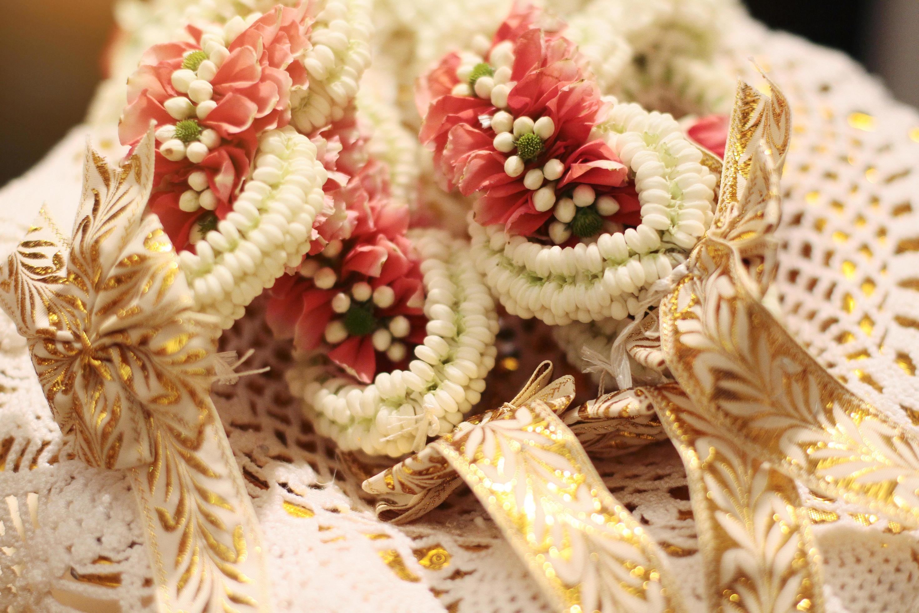 
									Flower garlands on a gold tray in tradition Thai wedding ceremony day. Jasmine garland. Stock Free