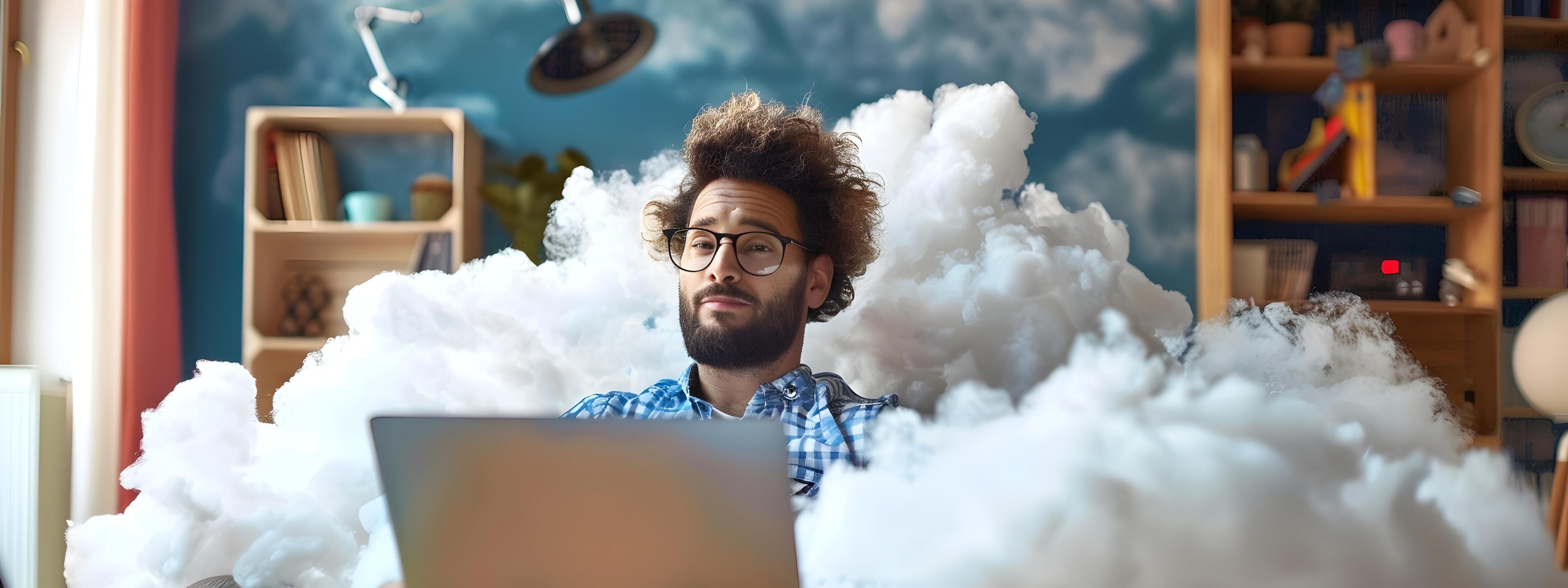 Happy Young Cloud Architect Focuses on Work with Laptop in Cozy Office Workspace Stock Free