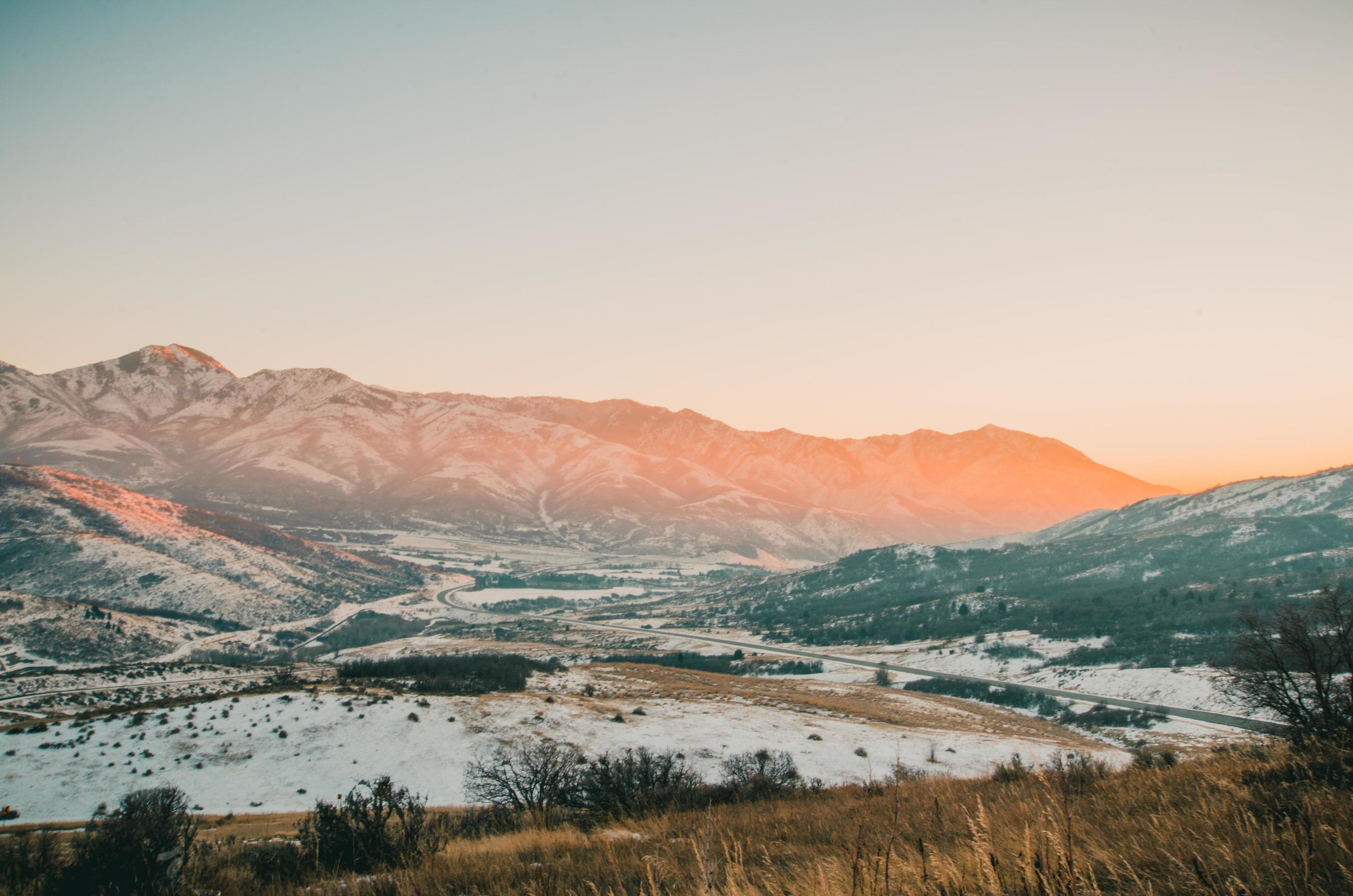 Sunrise on snowy mountains Stock Free