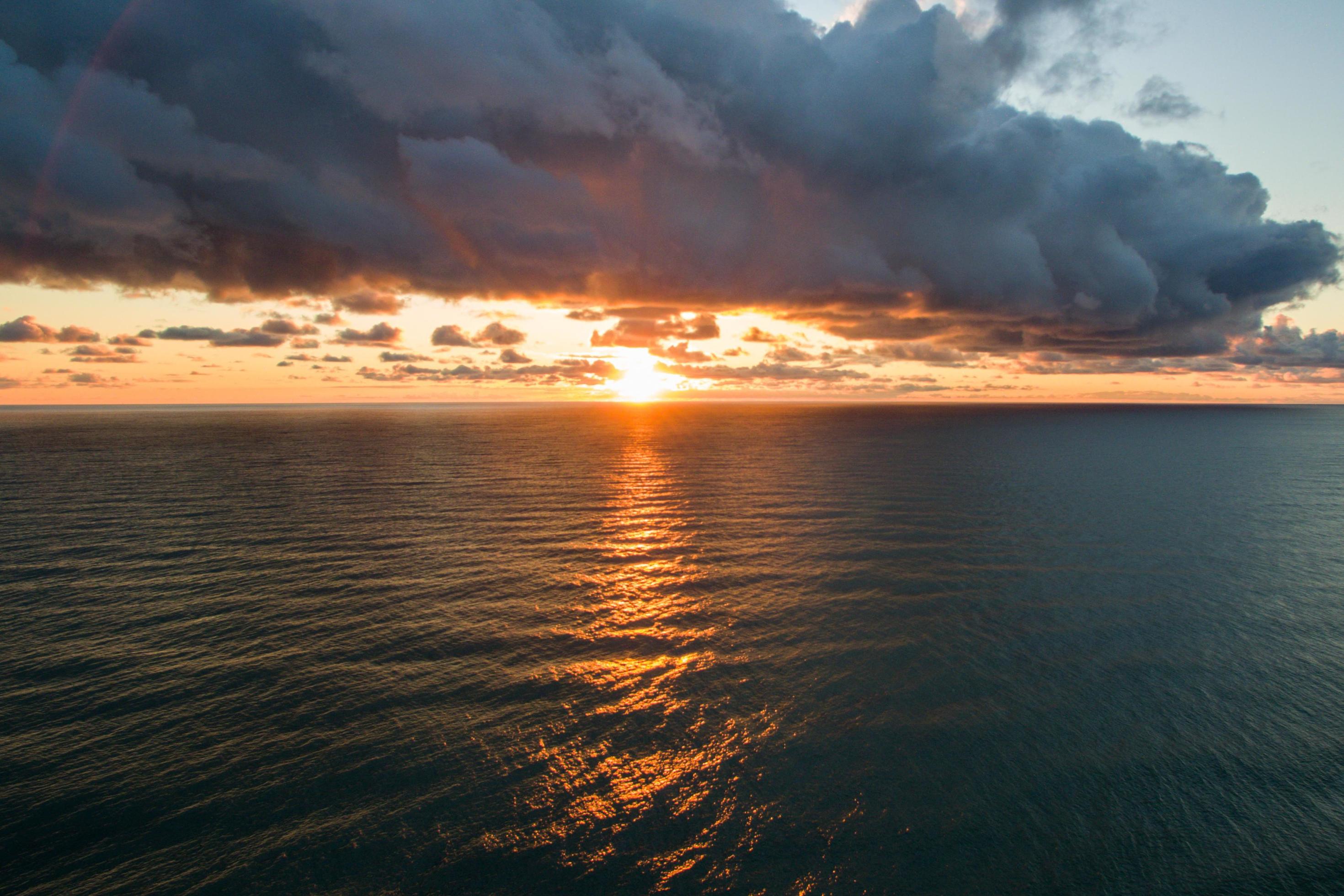 Aerial view of the sea landscape with a beautiful sunset Stock Free