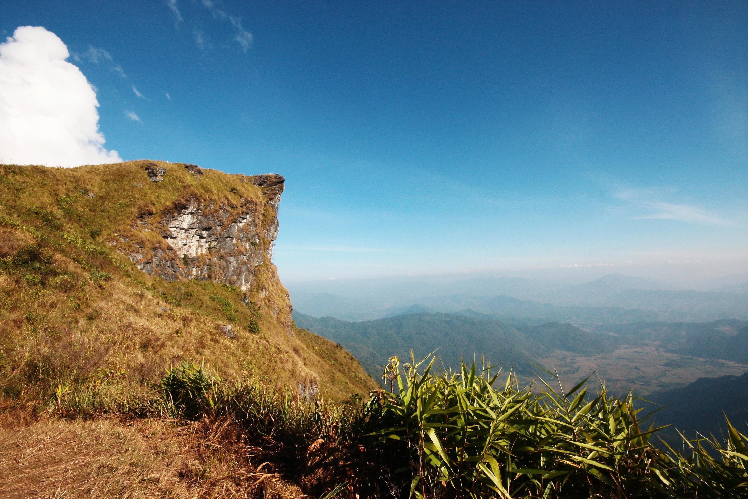 Beautiful landscape valley of mountain and blue sky in winter at Phu Chee Fah hill northern of Thailand Stock Free