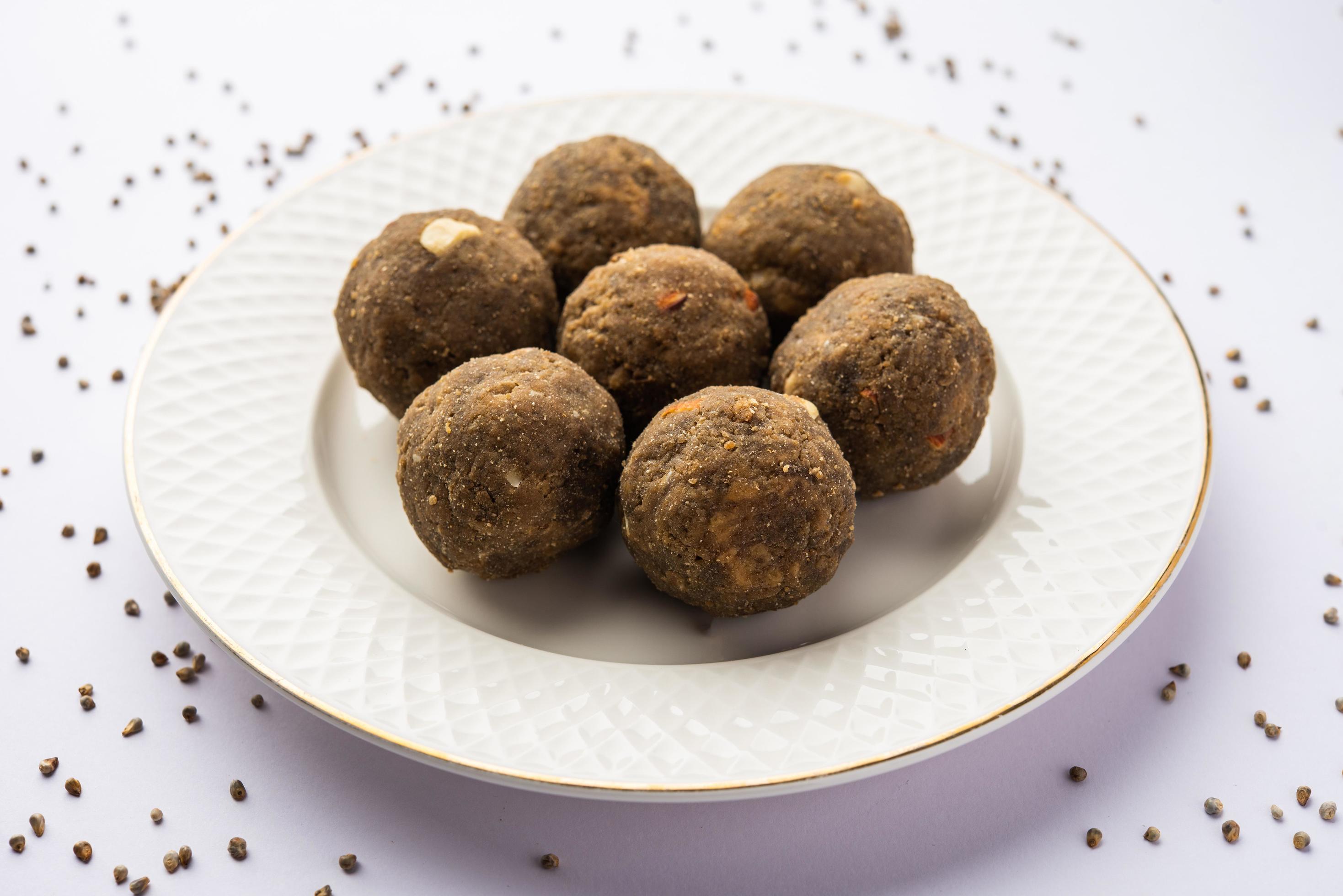 Bajra Atta Ladoo or kuler laddoo – Millet Flour Laddu, a popular winter sweet snack food from India Stock Free