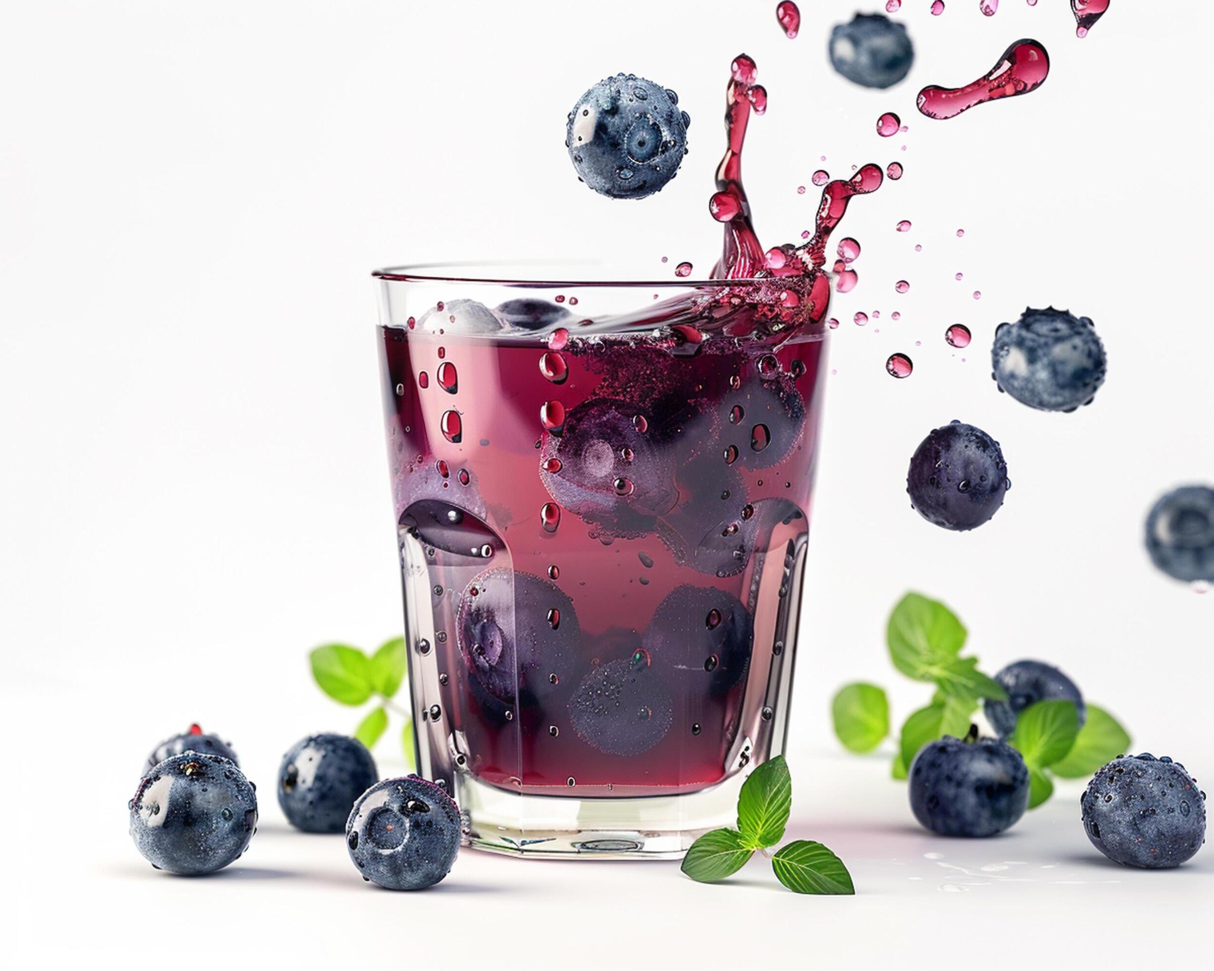 blueberry juice with splash on white background Stock Free