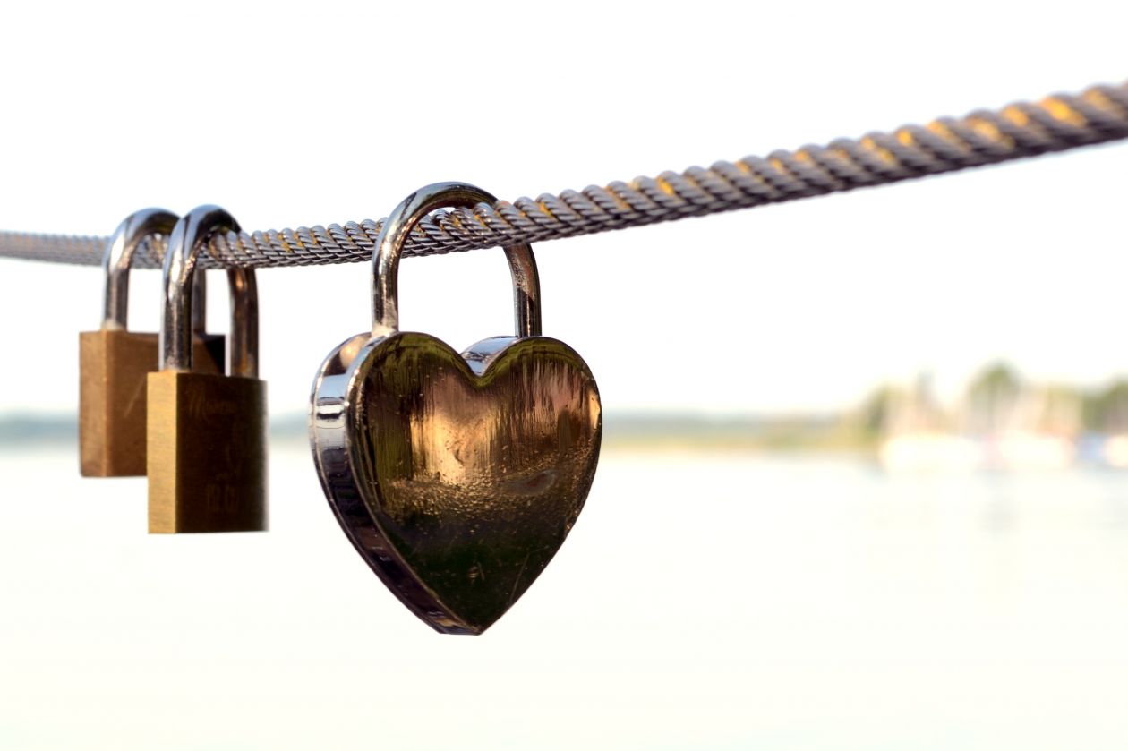 Padlocks on Railing Against Sky Stock Free