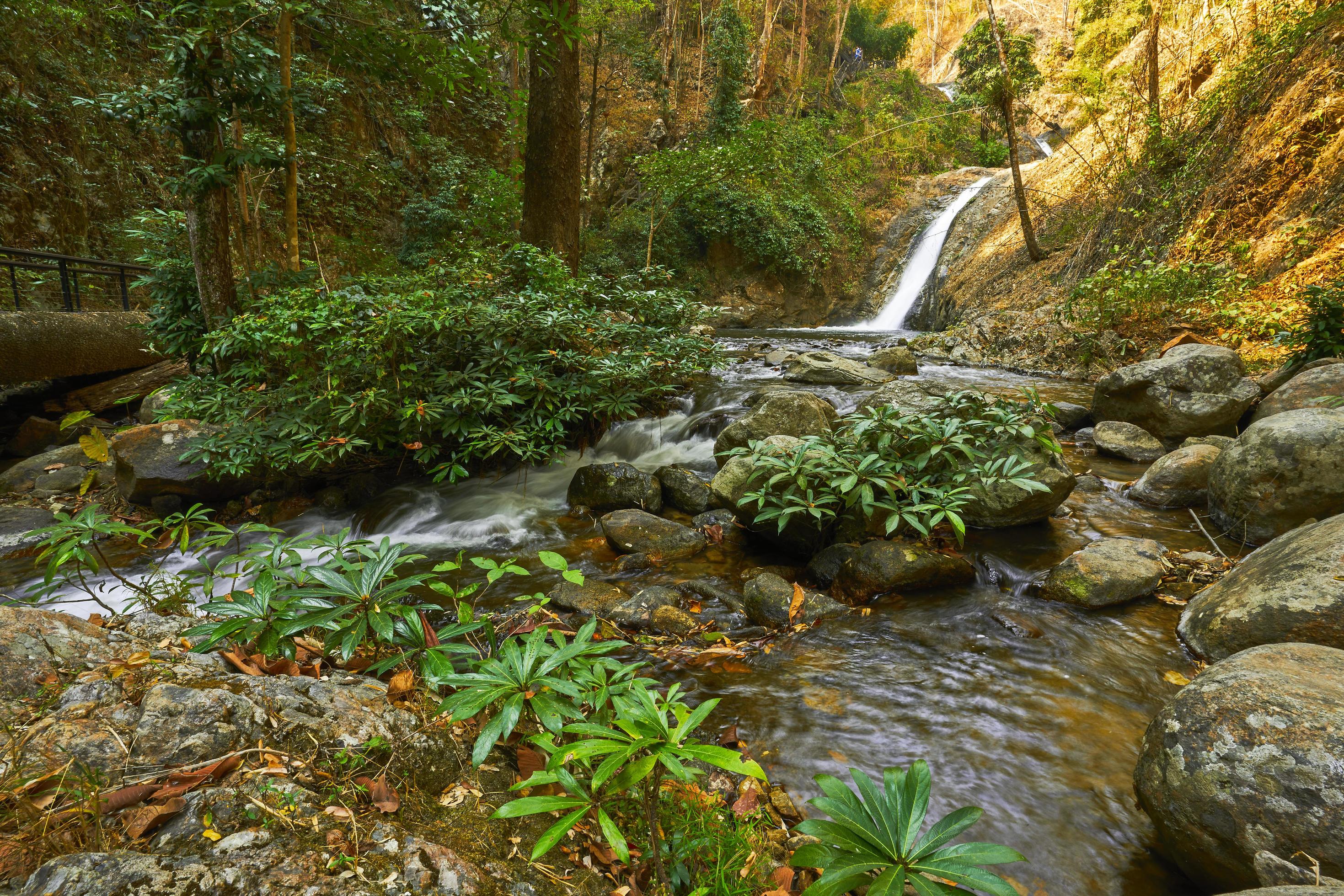 the great waterfall in Thailand, the Onsen atmosphere. beautiful deep forest waterfall in Thailand. Stock Free