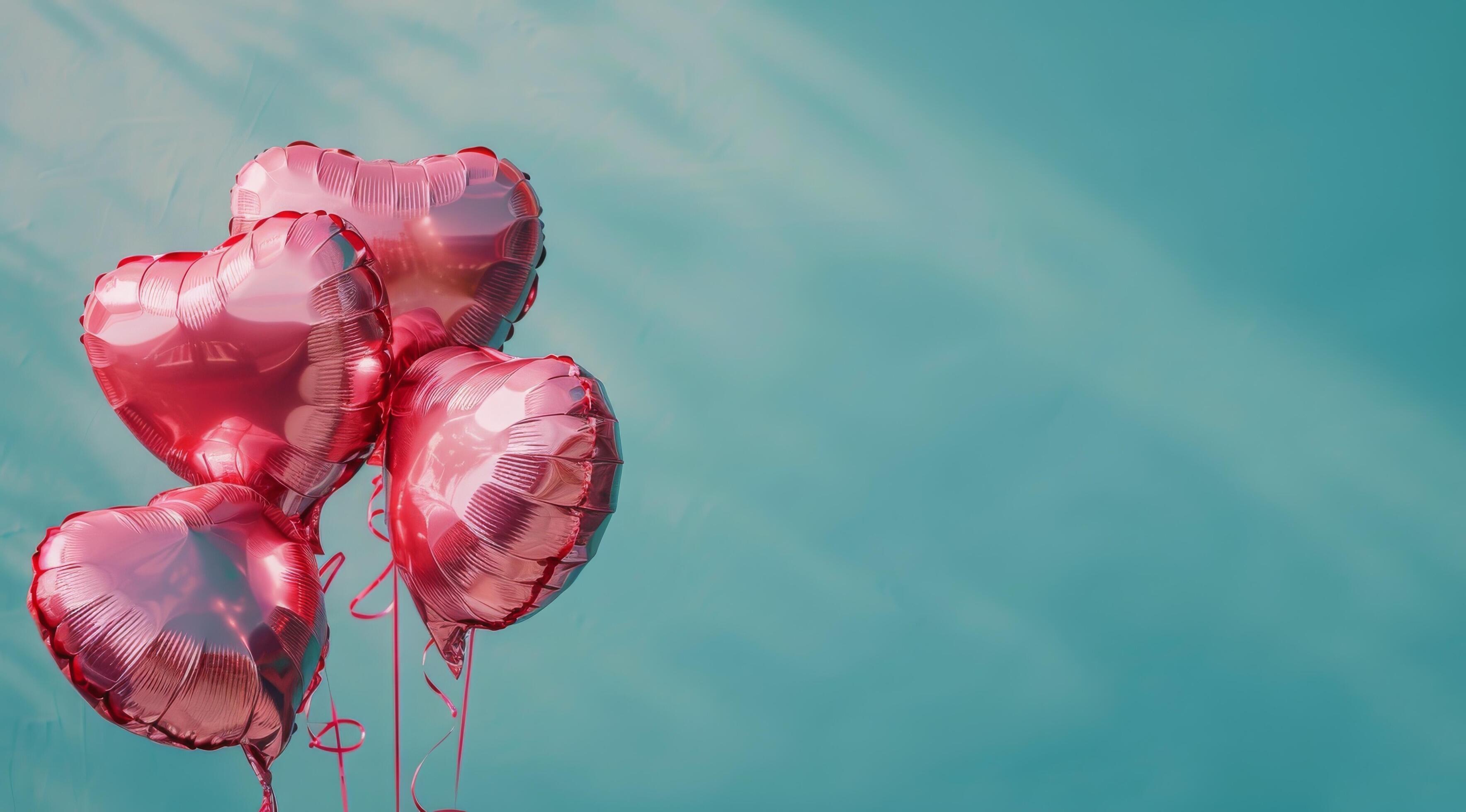 Pink Heart Balloons Against Teal Background Stock Free