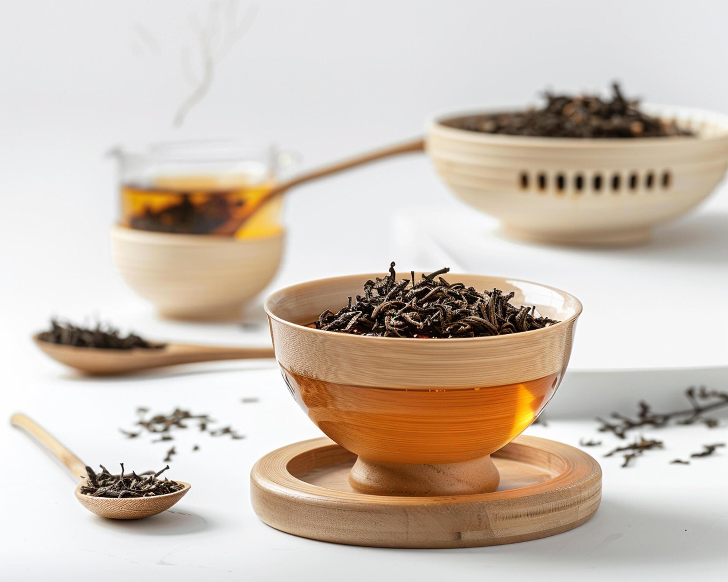 a bowl of tea with a wooden spoon and a wooden bowl Stock Free