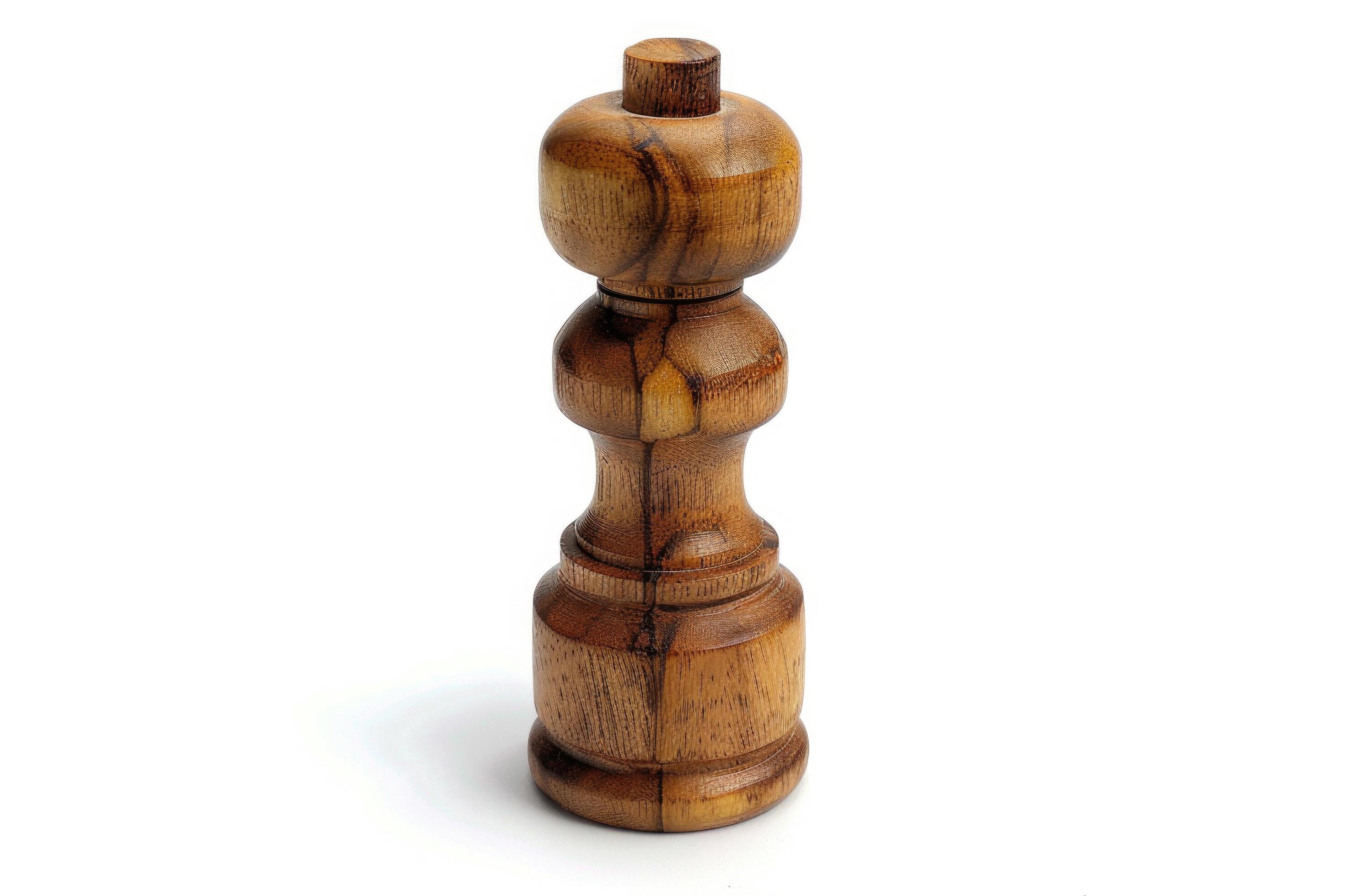 Wooden pepper mill on a white background. Stock Free