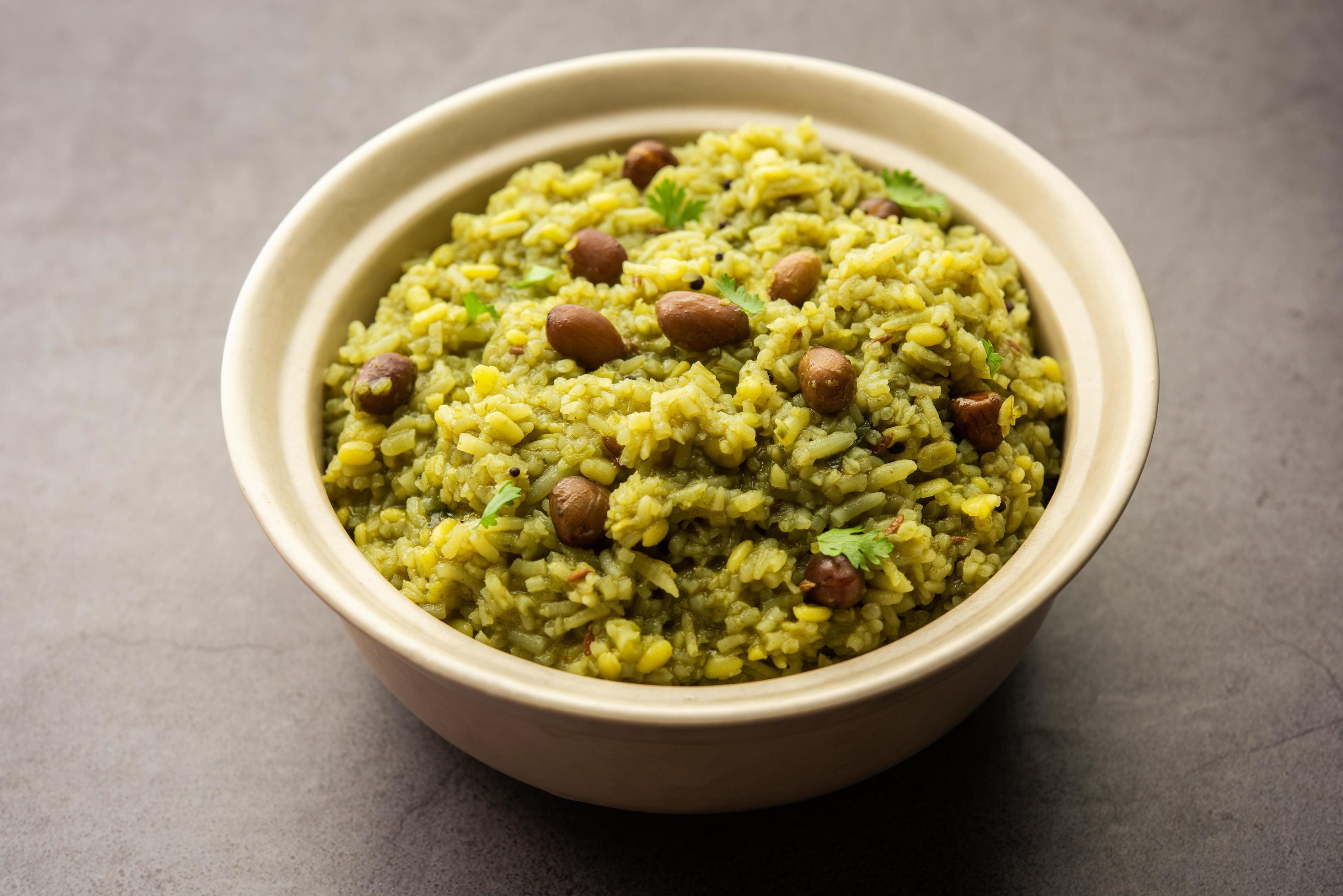 Palak khichdi is a one pot nutritious meal of mung lentils and rice with spinach, Indian food Stock Free