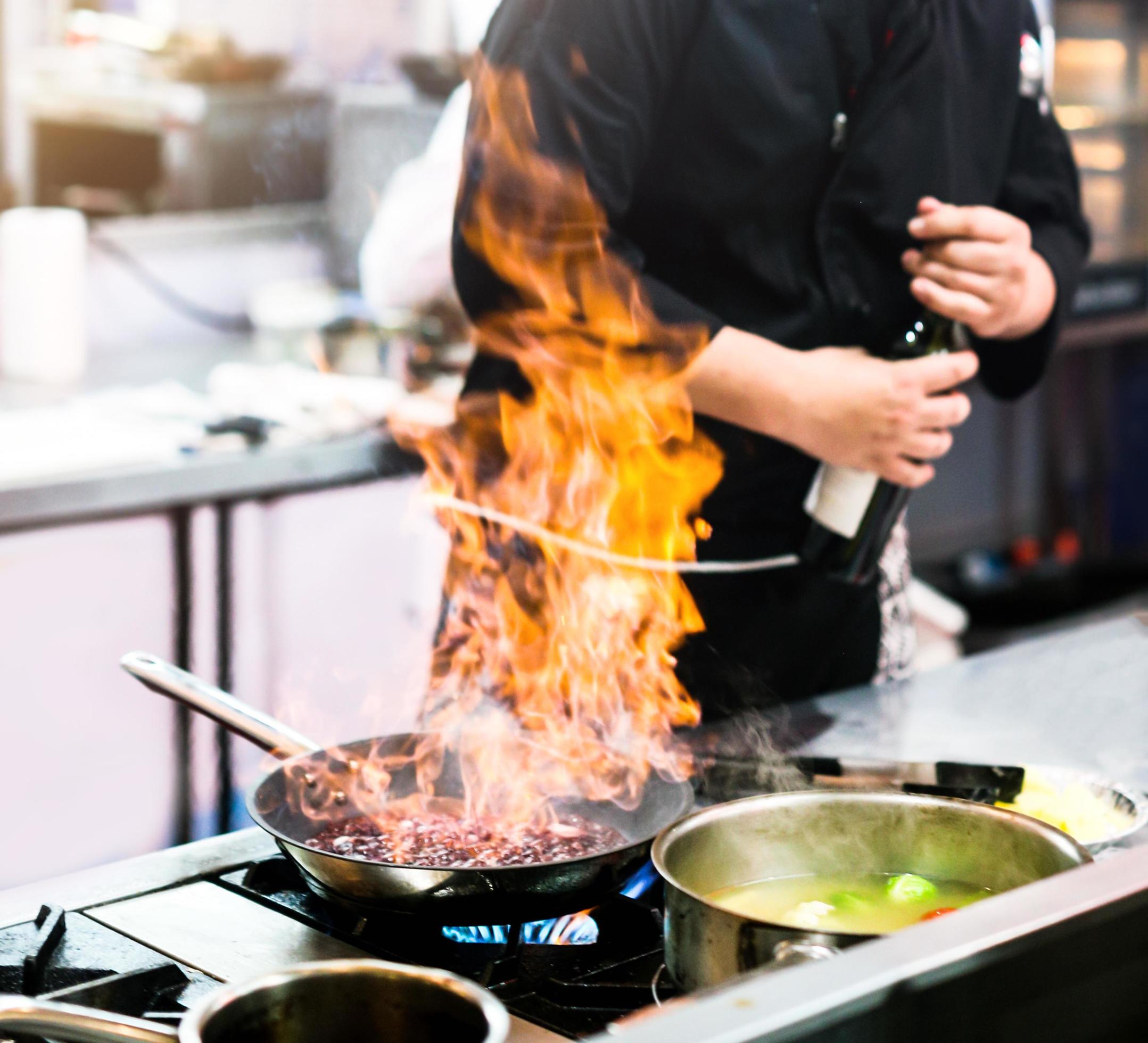 Chef cooking, Chef preparing food in the kitchen Stock Free