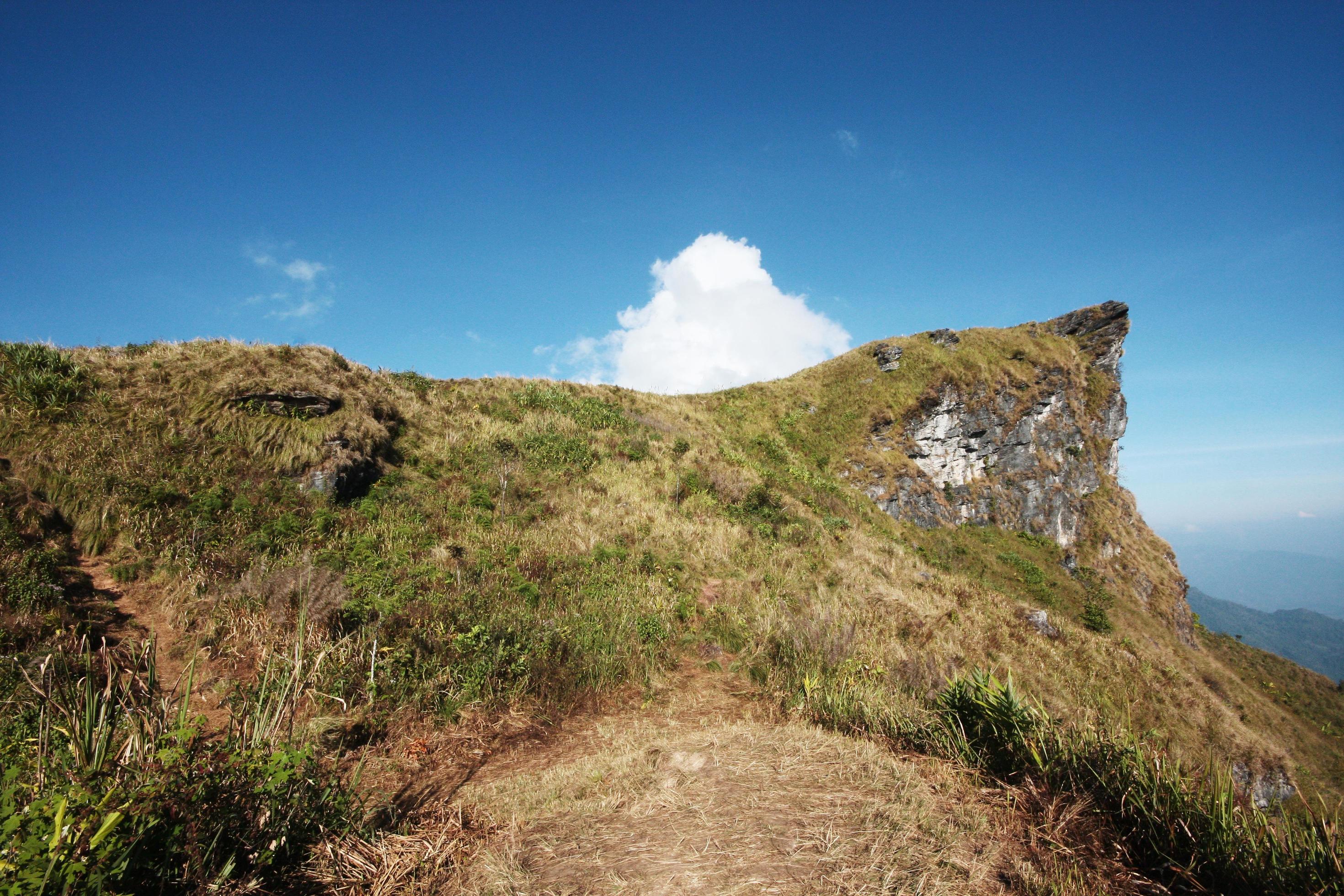 Beautiful landscape valley of mountain and blue sky in winter at Phu Chee Fah hill northern of Thailand Stock Free