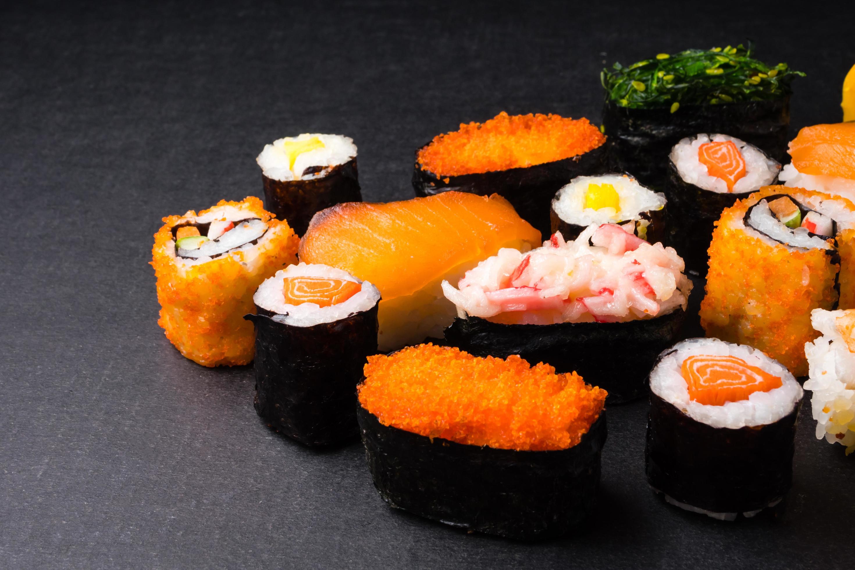 Sushi set on black background, Japanese food. Stock Free