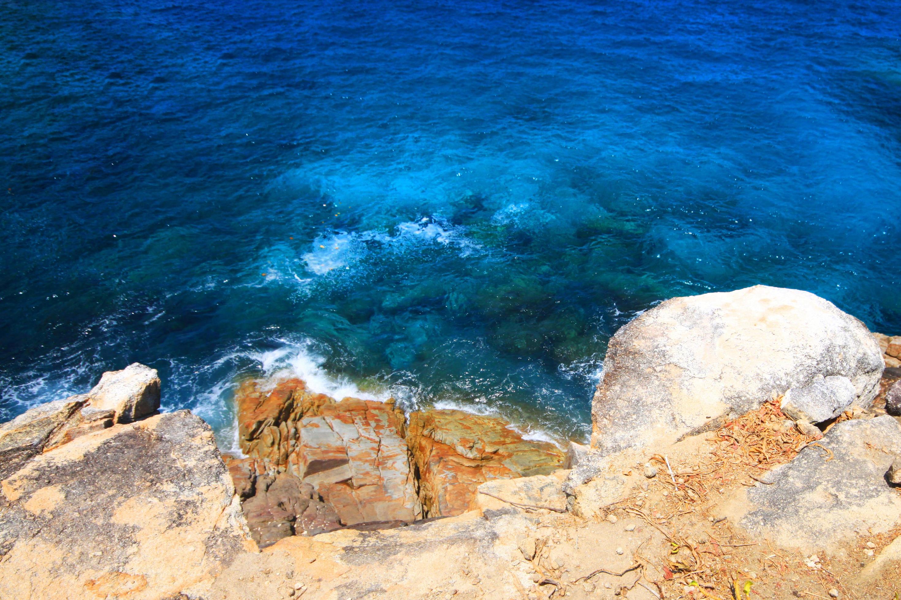 Beautiful Paradise summer and seascape with sunset of sea horizon and Calm ocean near rock Cape Stock Free