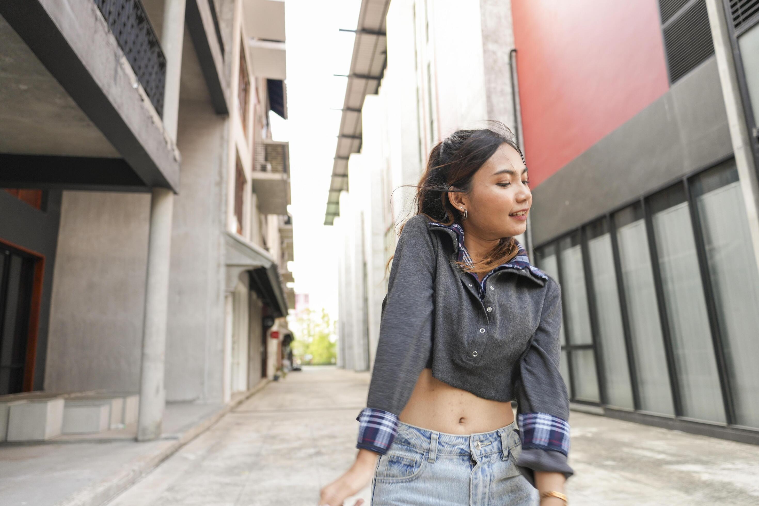 
									Asian women do freestyle hip hop and breakdancing in a public space in the middle of the city. With a cheerful and happy attitude Stock Free