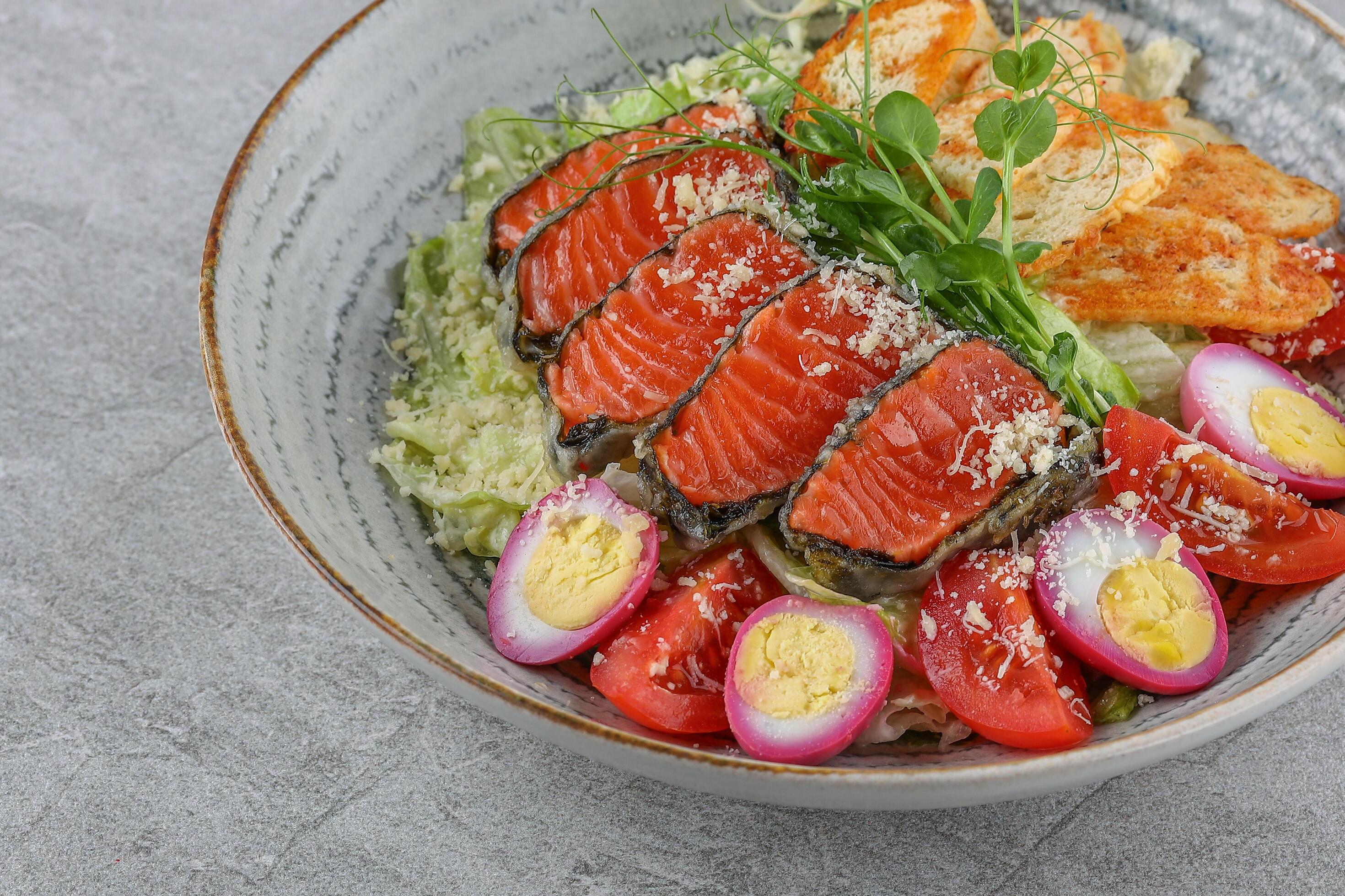 Salmon salad on a stone background studio shooting 5 Stock Free