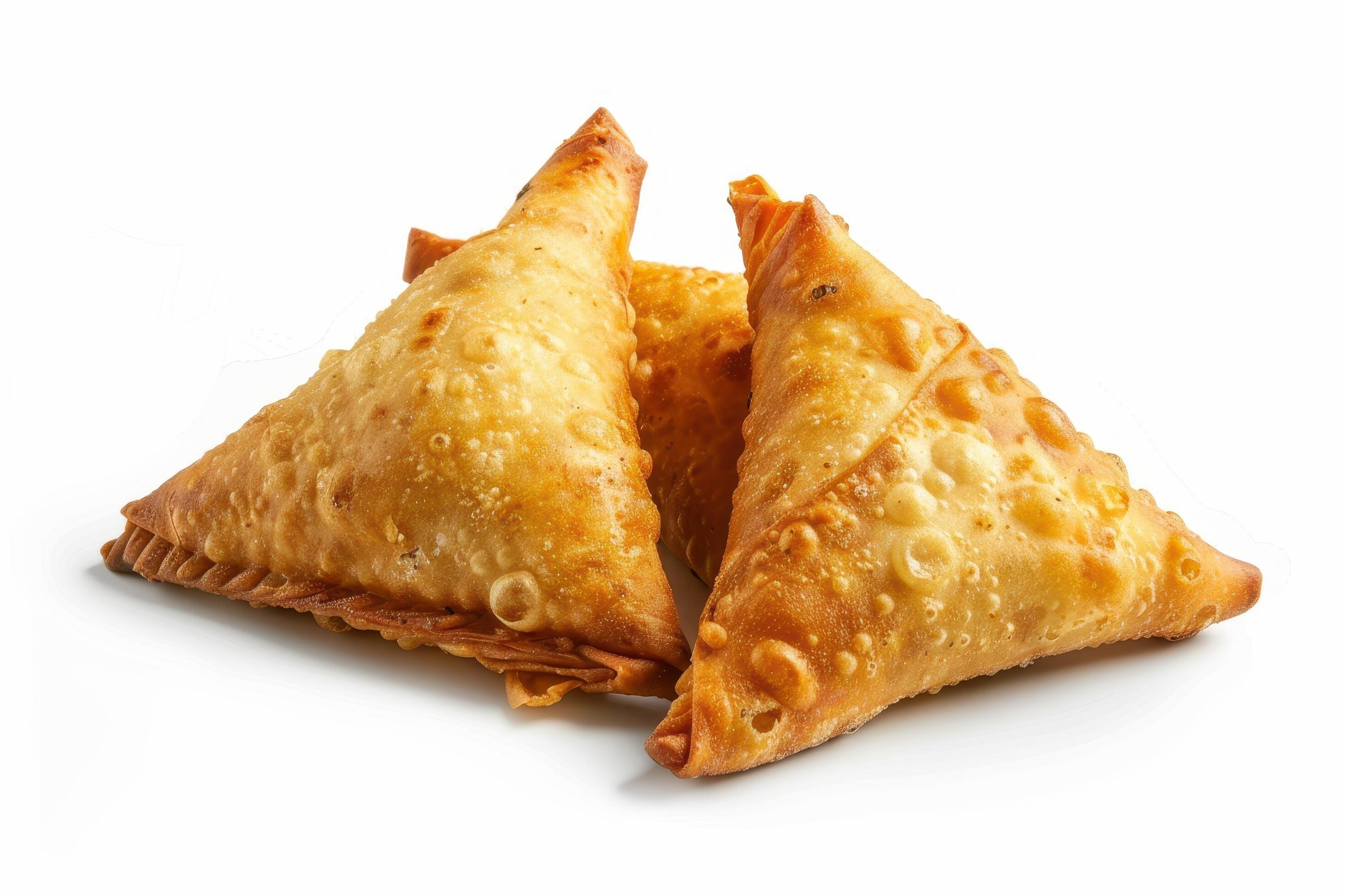 Two Crispy Golden Fried Samosas on White Background Stock Free