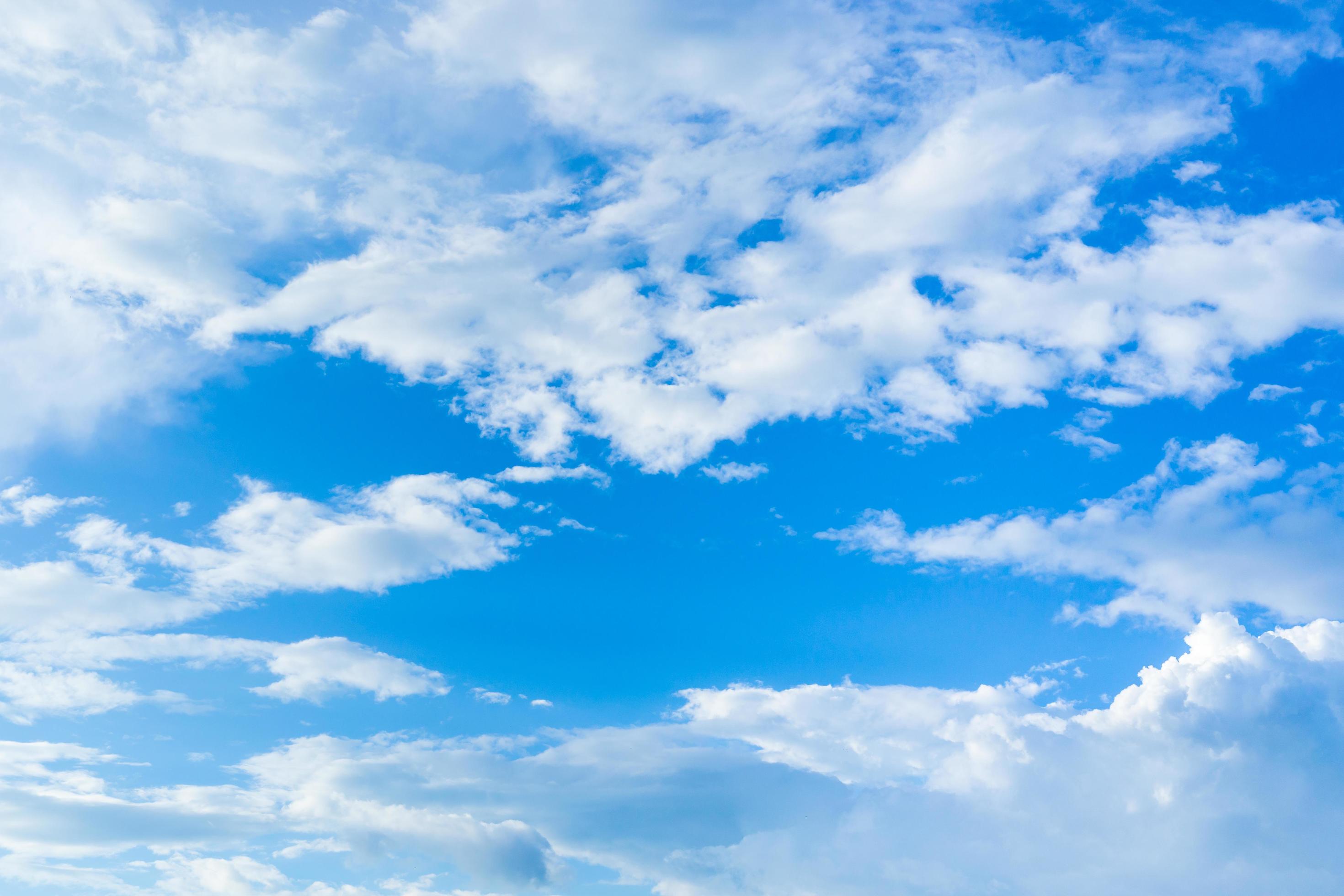 white clouds in the blue sky for nature background Stock Free