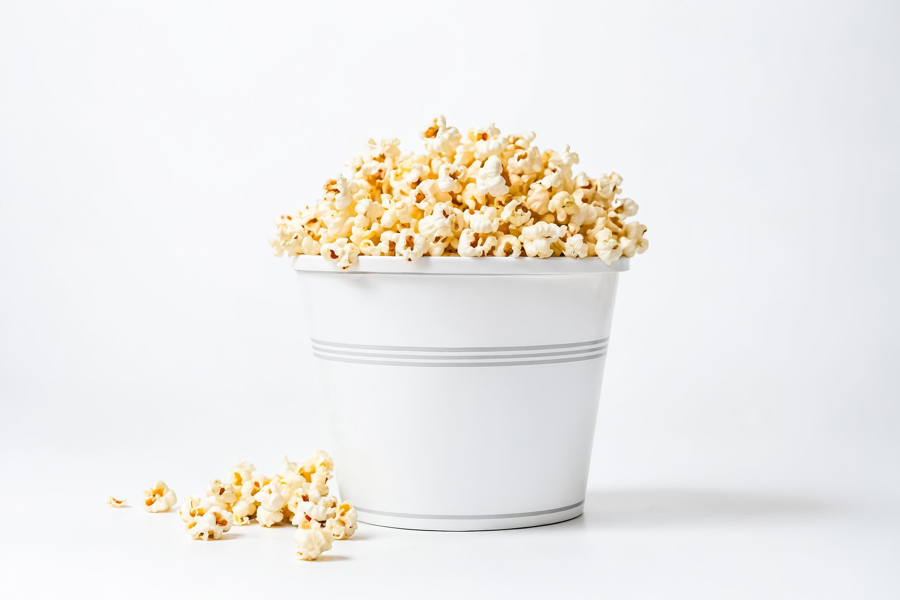 Popcorn in a White Bucket on a White Background Stock Free