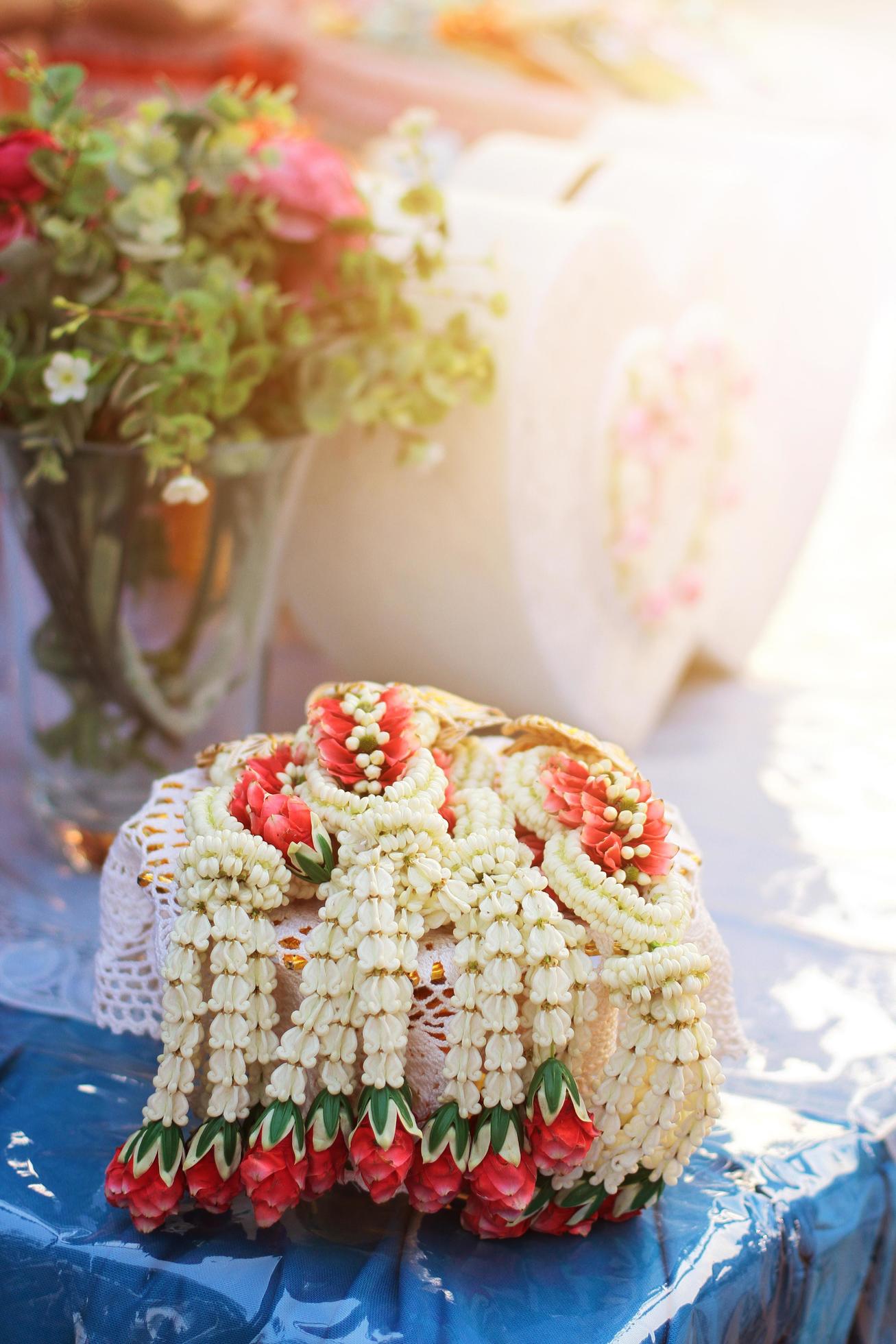 Flower garlands on a gold tray in tradition Thai wedding ceremony day. Jasmine garland. Stock Free