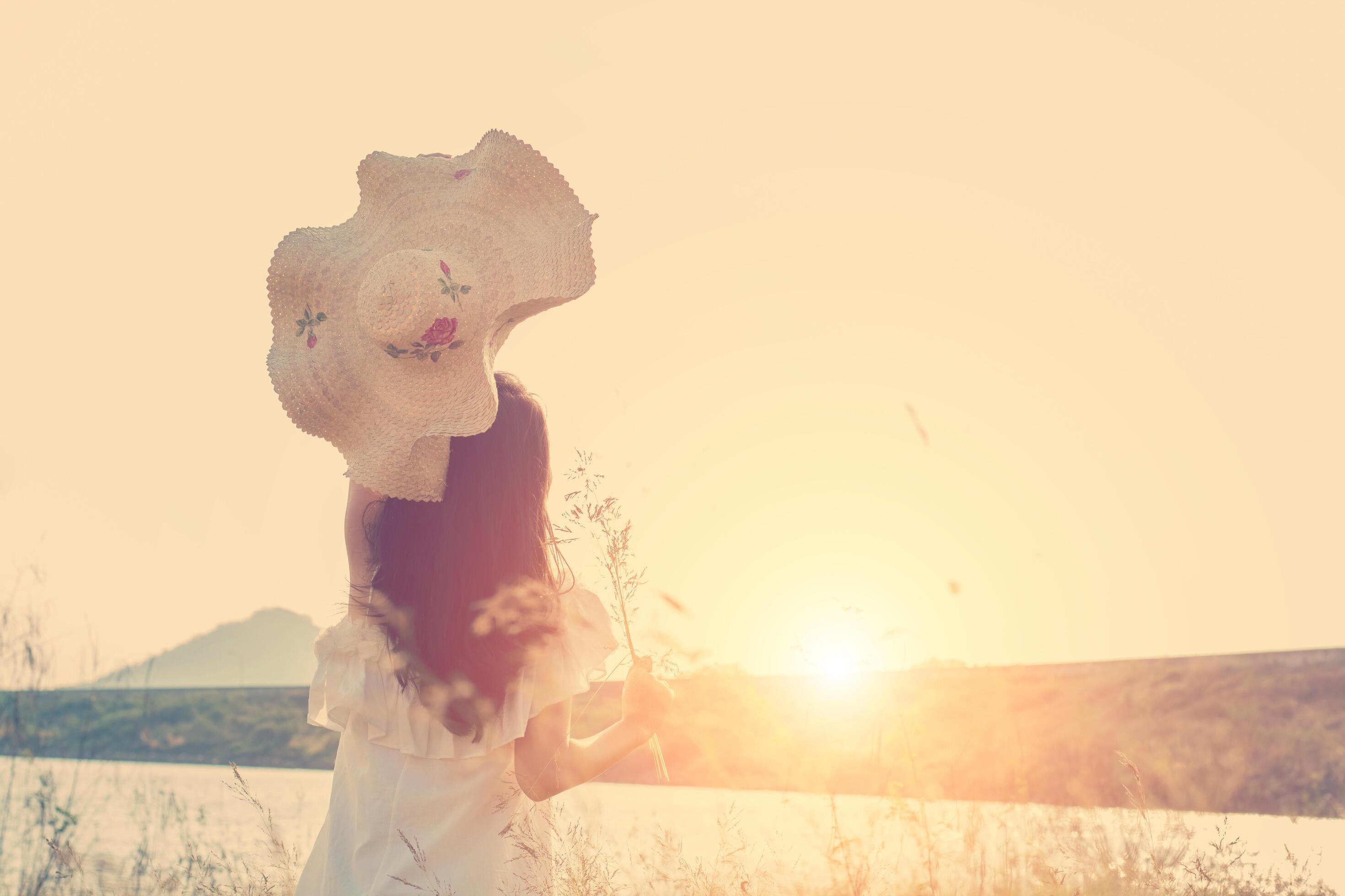 Beautiful young woman enjoying the fabulous nature with sunrise Stock Free