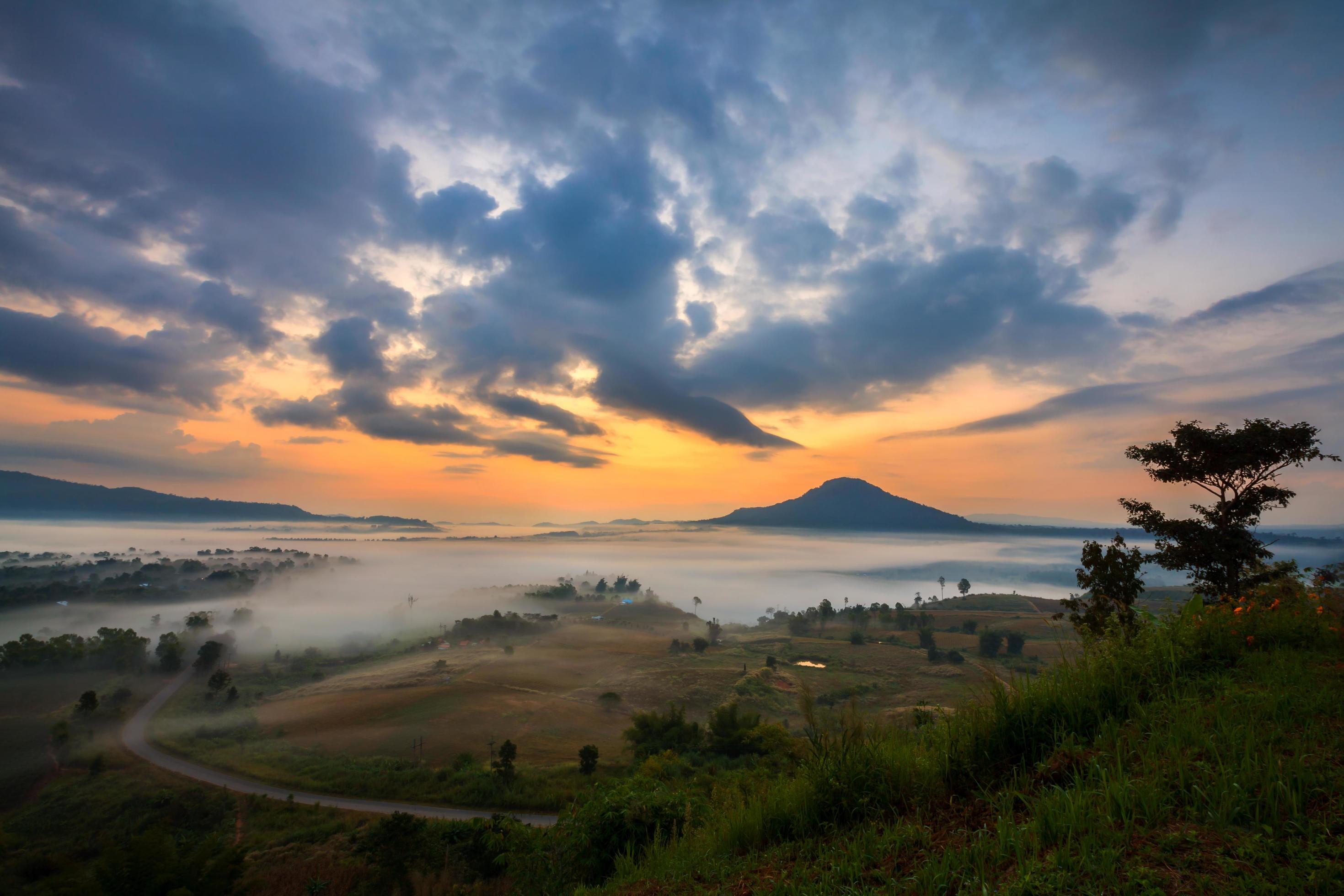 misty morning sunrise and road in mountain at Khao-kho Phetchabun,Thailand Stock Free