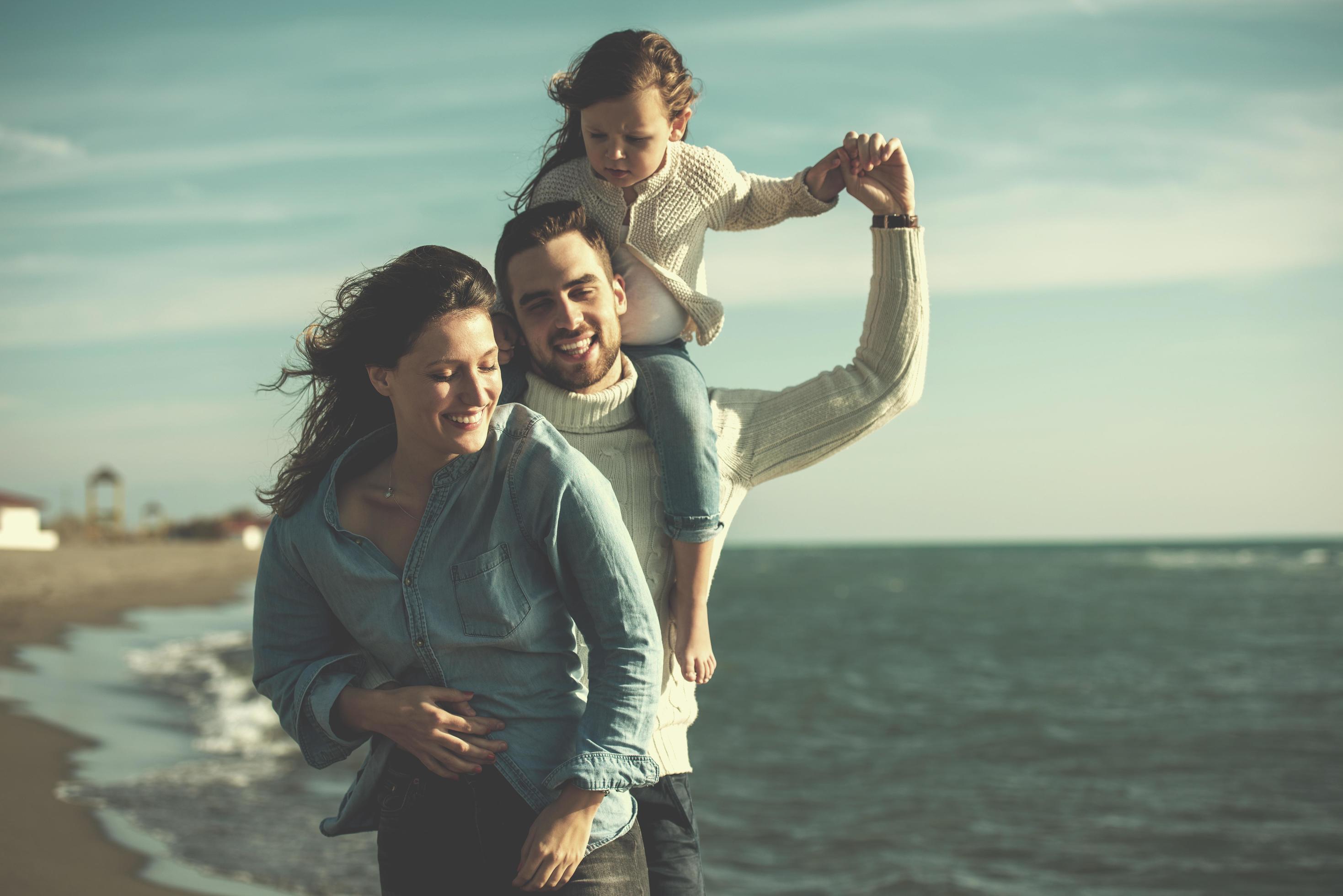 Young family enjoying vecation during autumn Stock Free