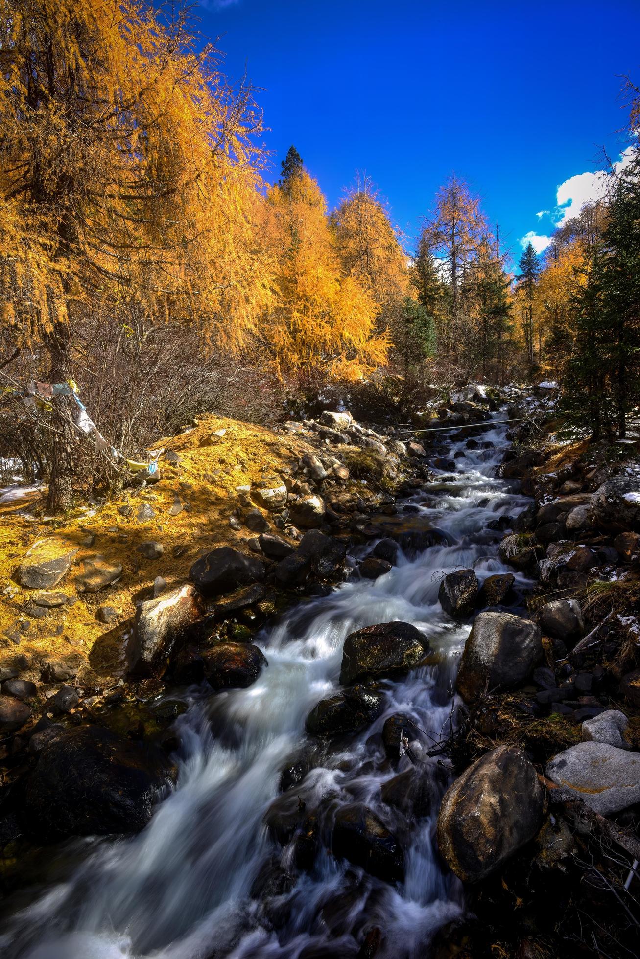 Spectacular scenery in the high mountains of western Sichuan, China, with different seasons Stock Free