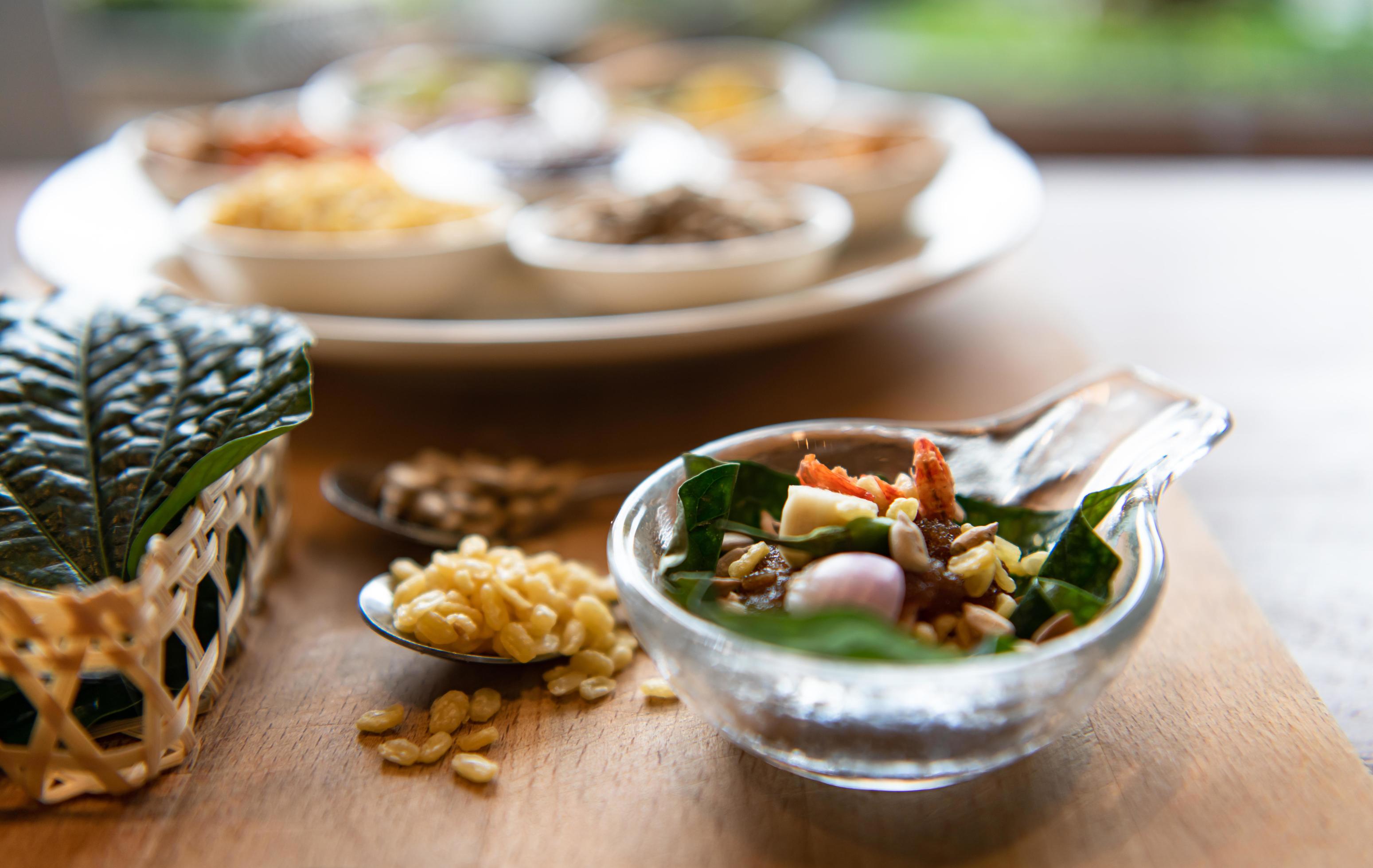 Thai food for eat before the main course. wrapped in spicy wrapped leaves Stock Free